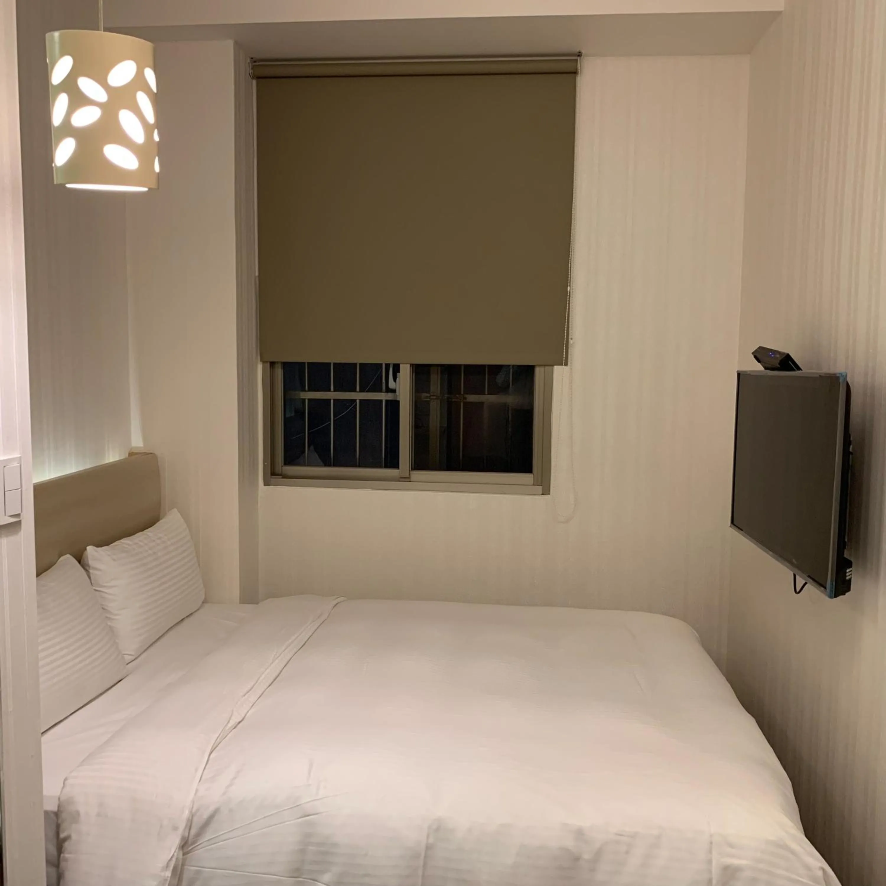 Bed in E-Coast Star Hotel