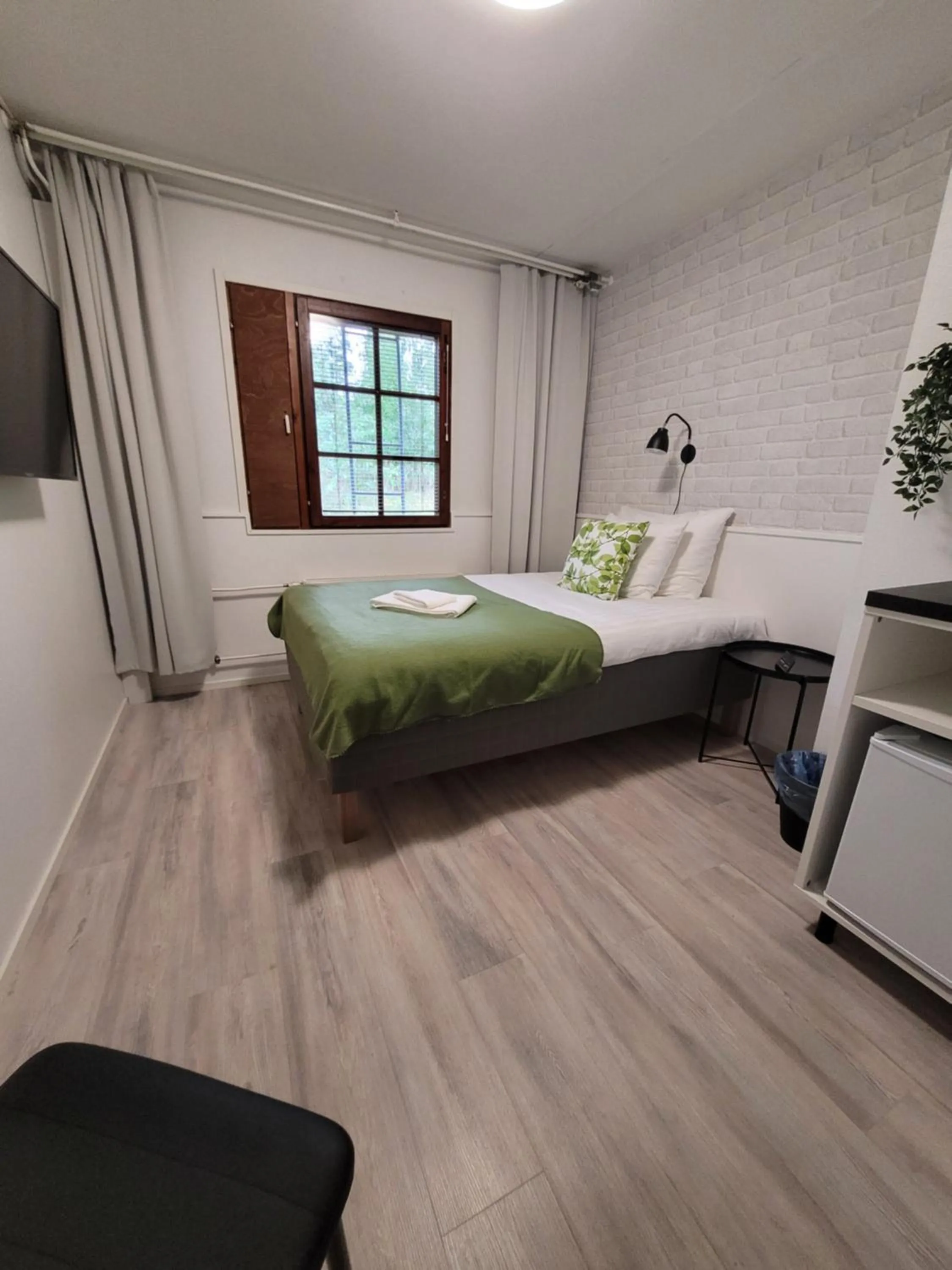 Photo of the whole room, Bed in Hotelli Salpakangas