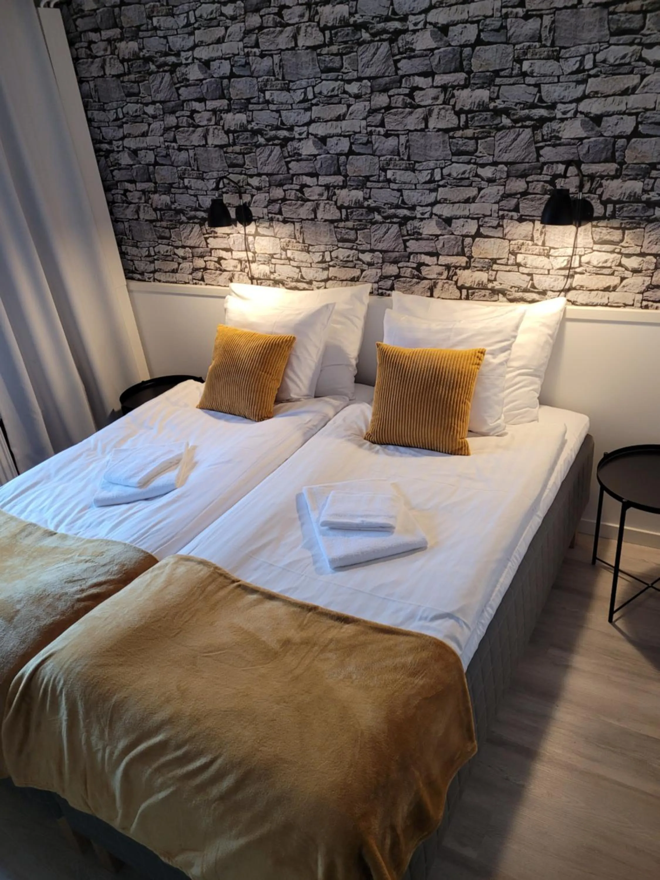 Photo of the whole room, Bed in Hotelli Salpakangas