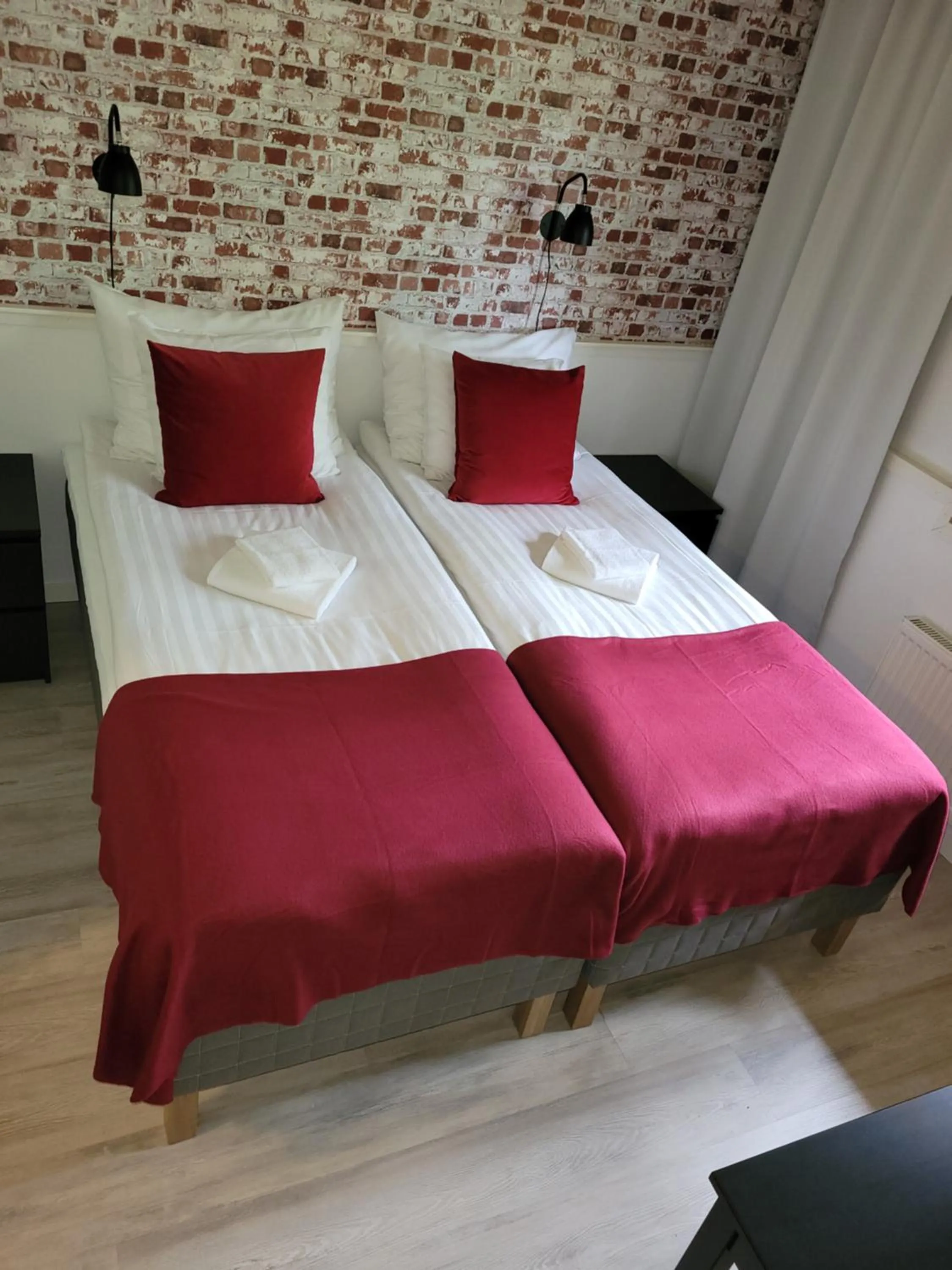 Photo of the whole room, Bed in Hotelli Salpakangas