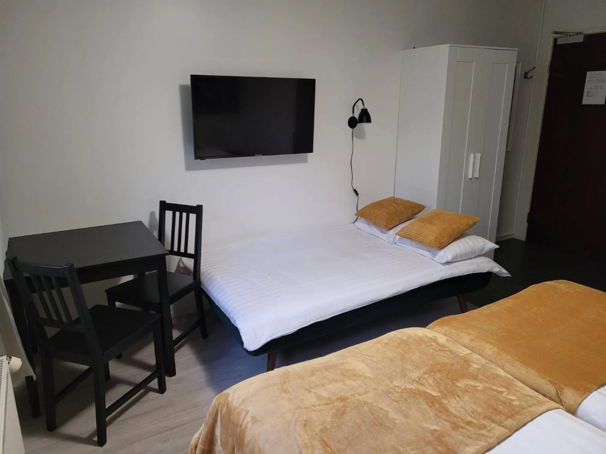 Photo of the whole room, Bed in Hotelli Salpakangas