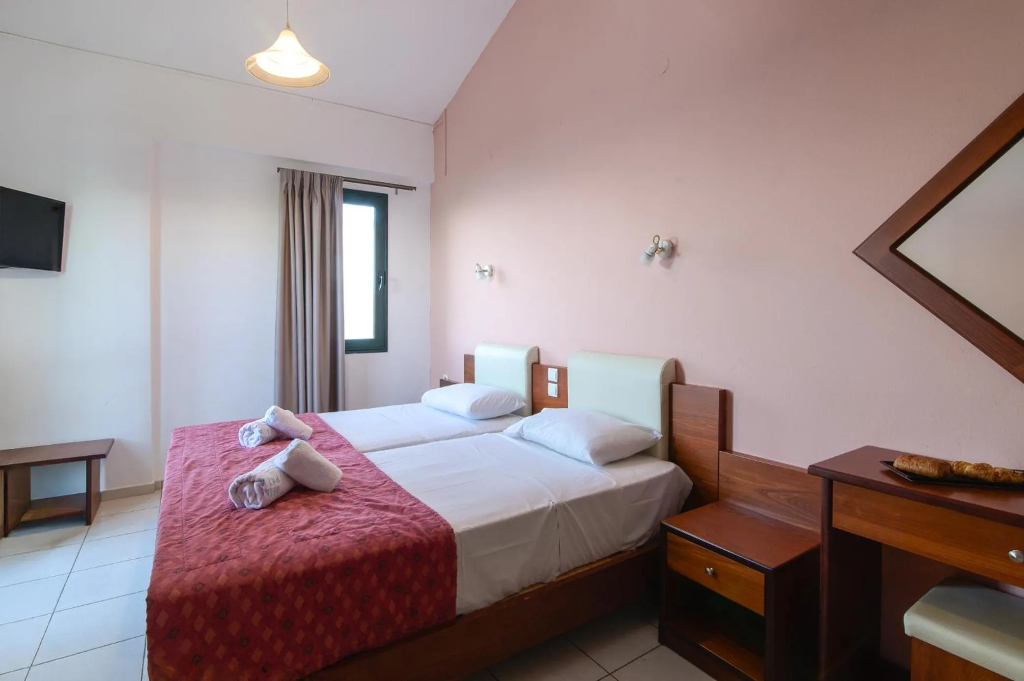 Bed in Ariadni Palace Apartments