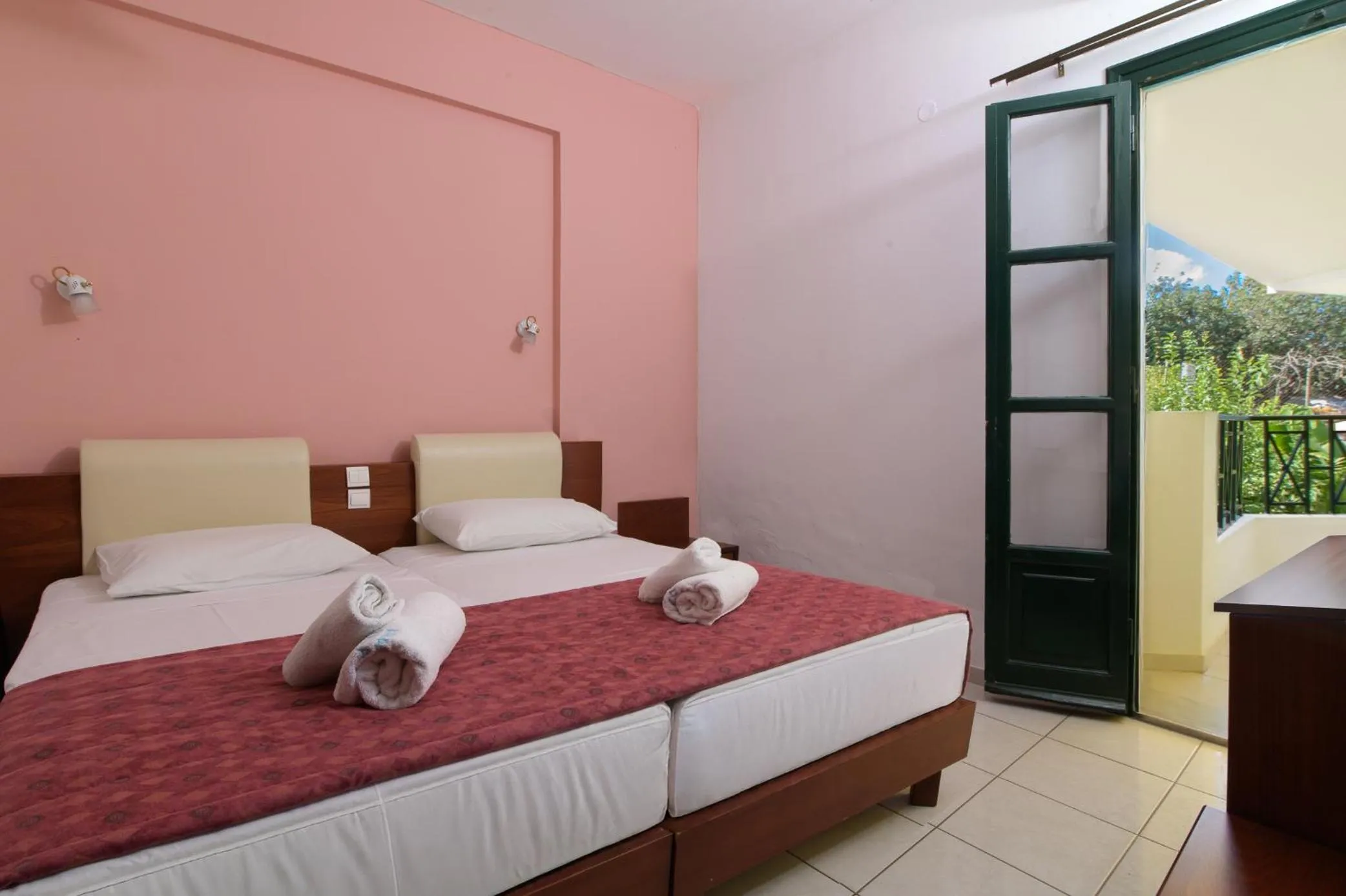 Bed in Ariadni Palace Apartments