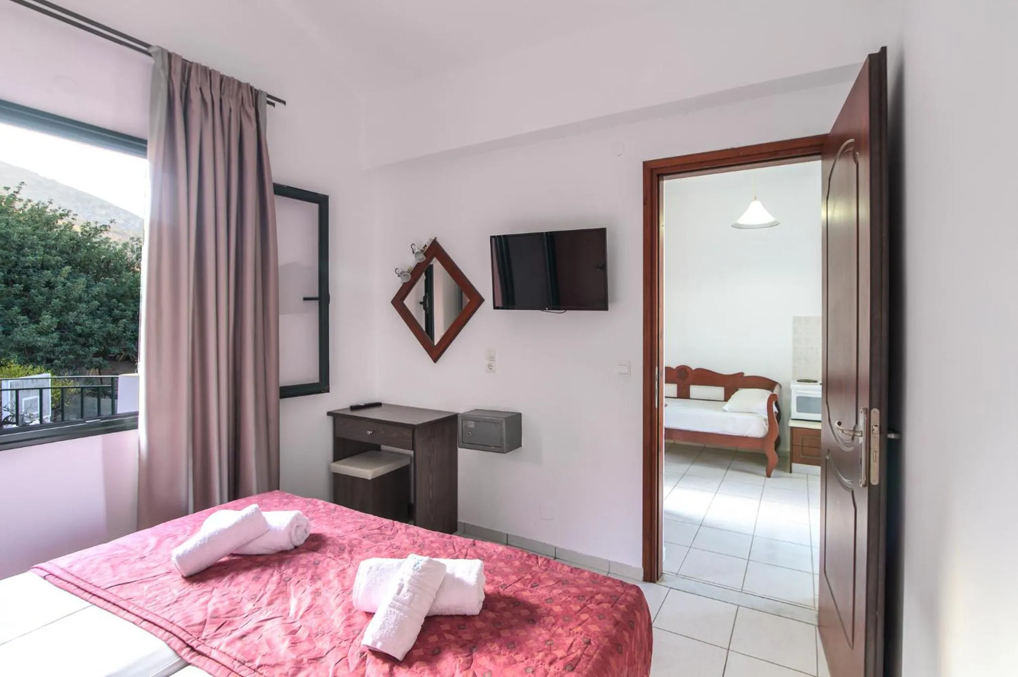 Bed in Ariadni Palace Apartments