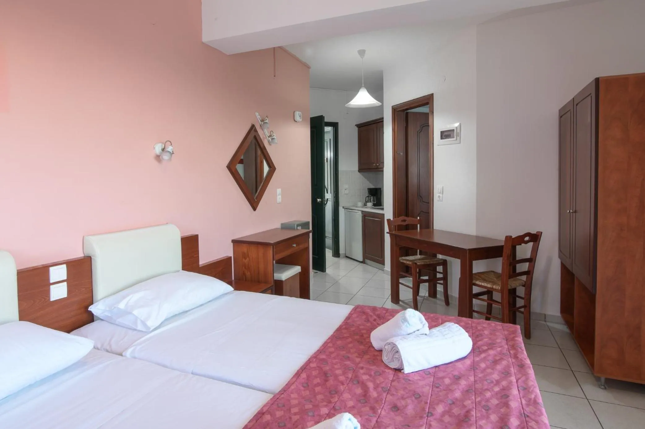 Bed in Ariadni Palace Apartments