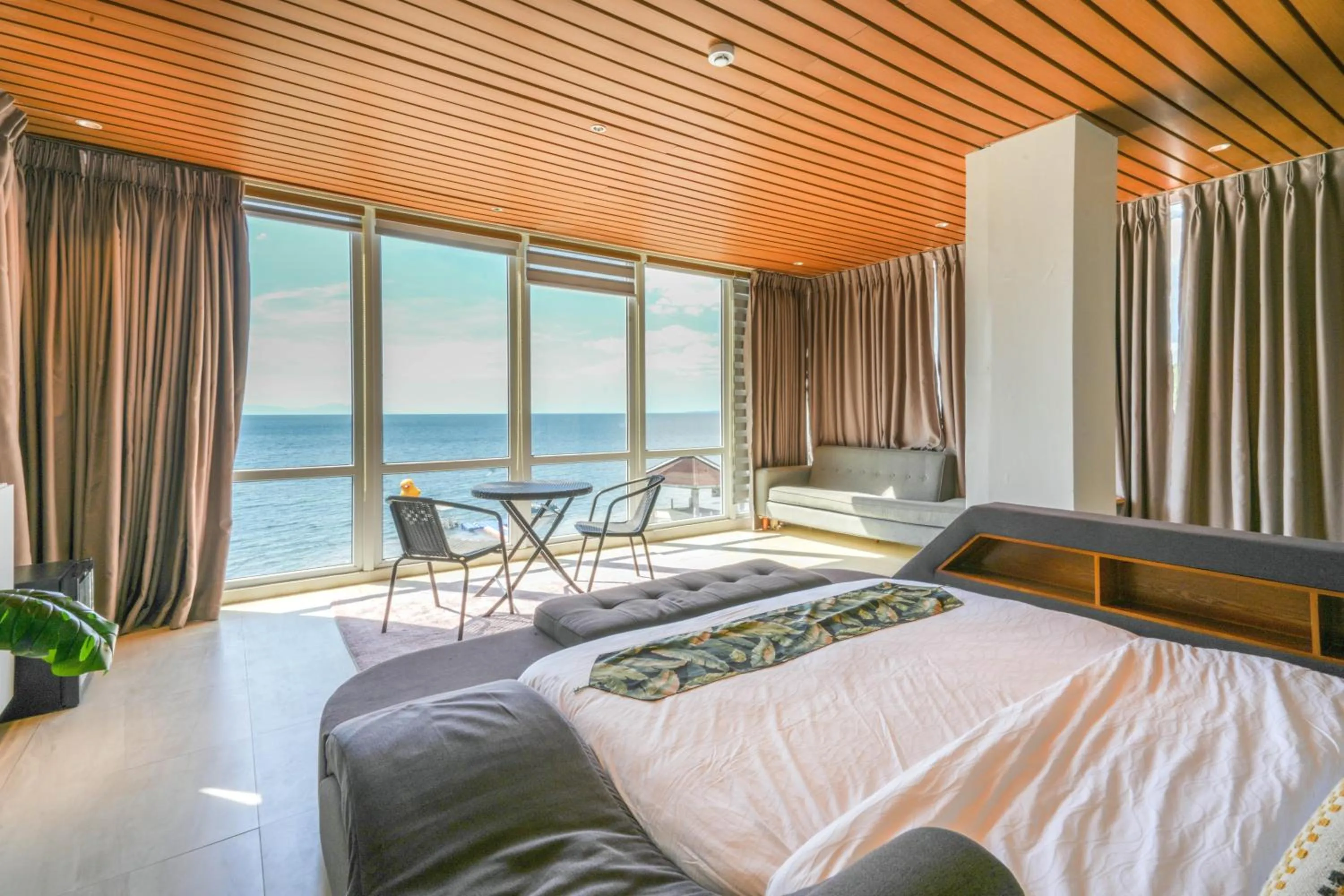 Bed in Destino Beach Resort and Hotel