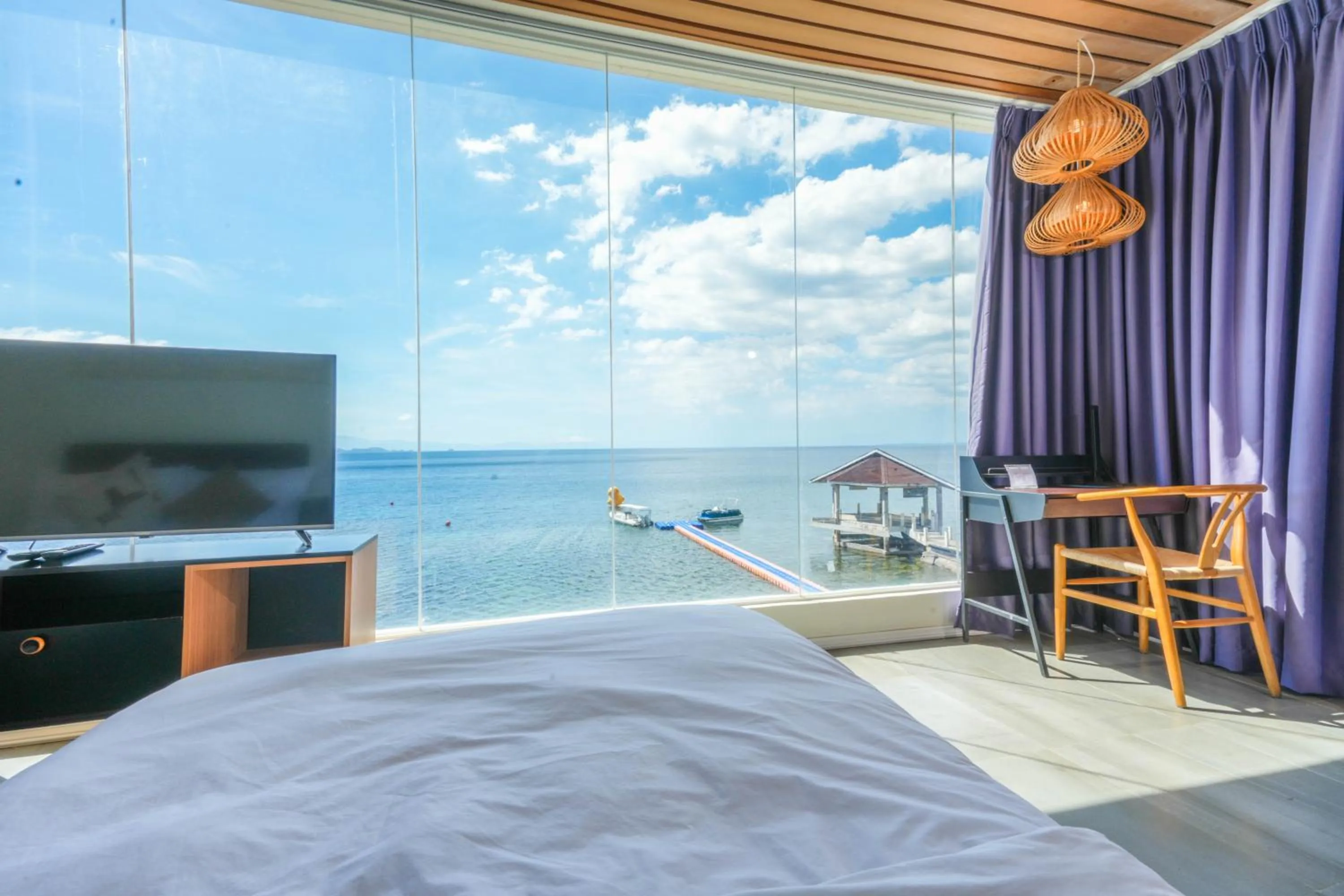 Bed in Destino Beach Resort and Hotel