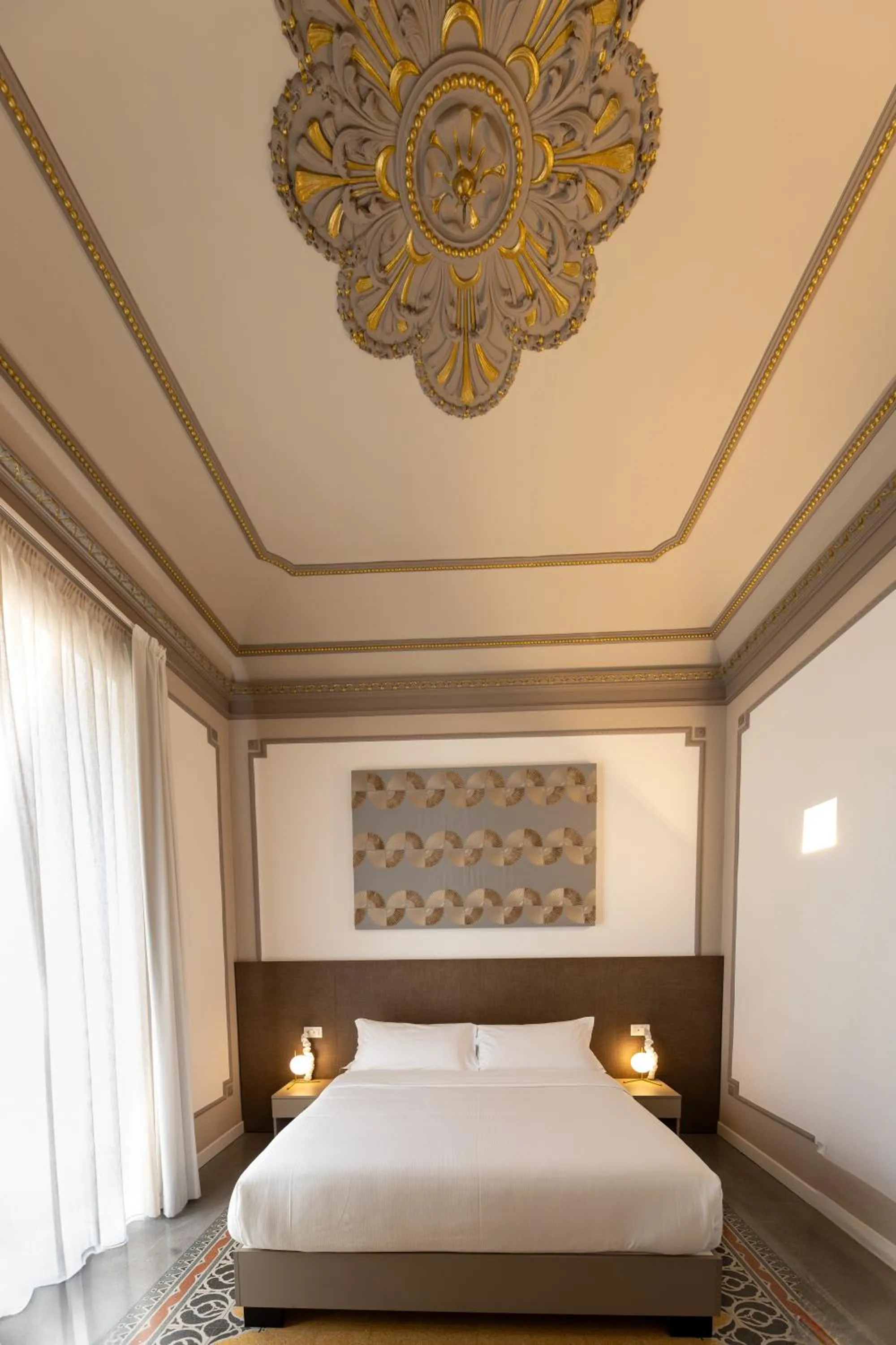 Bed in Riflessi Acireale Palace Suites