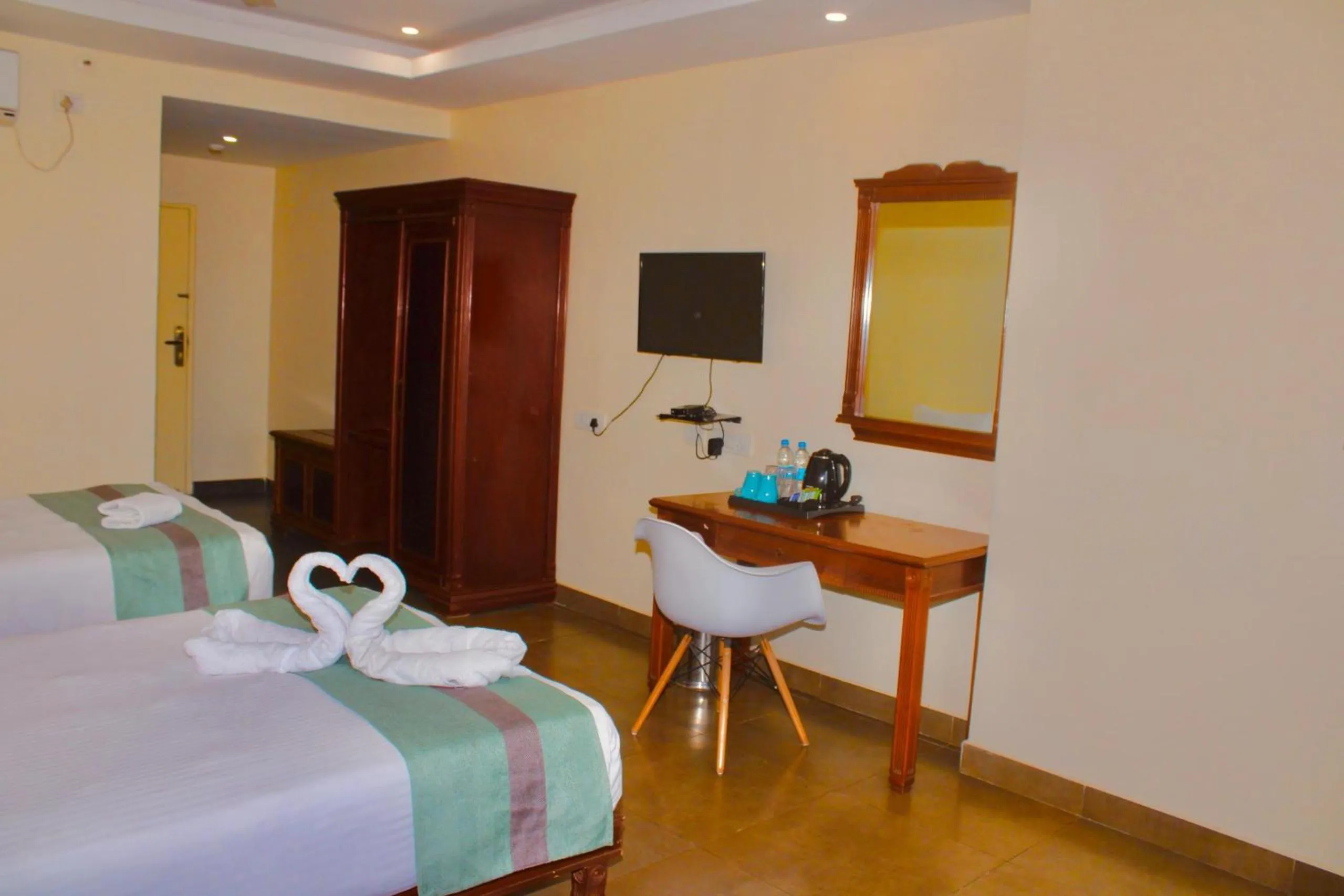 Bed in THE CENT HOTEL