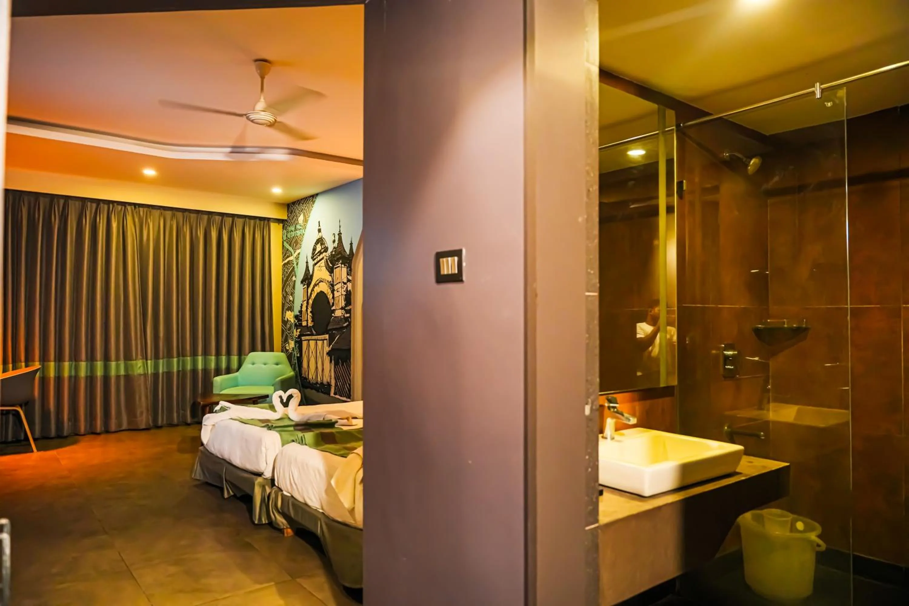 Bed in THE CENT HOTEL