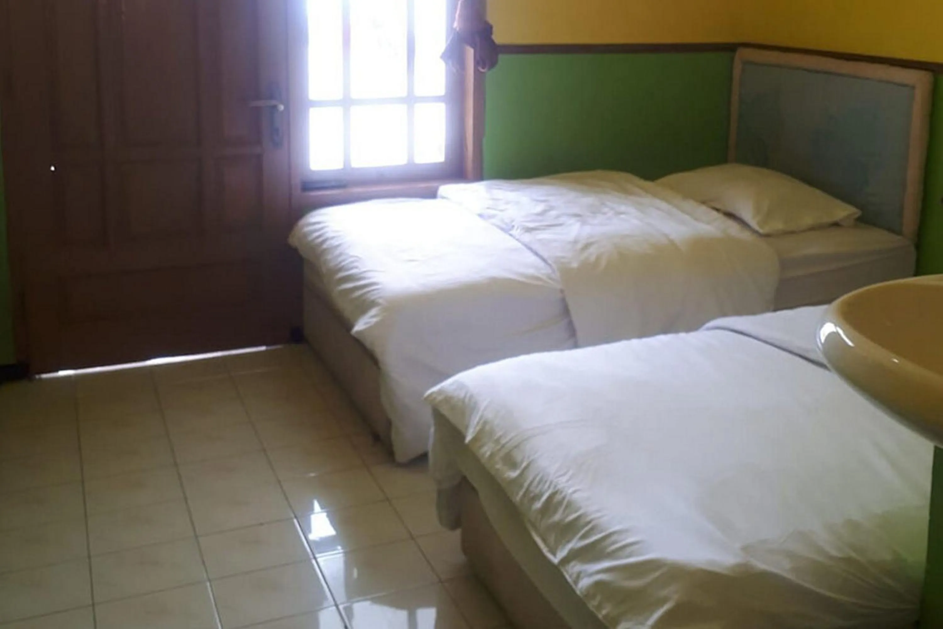 Bed in Ambar Tosari Homestay at Desa Wisata Bromo