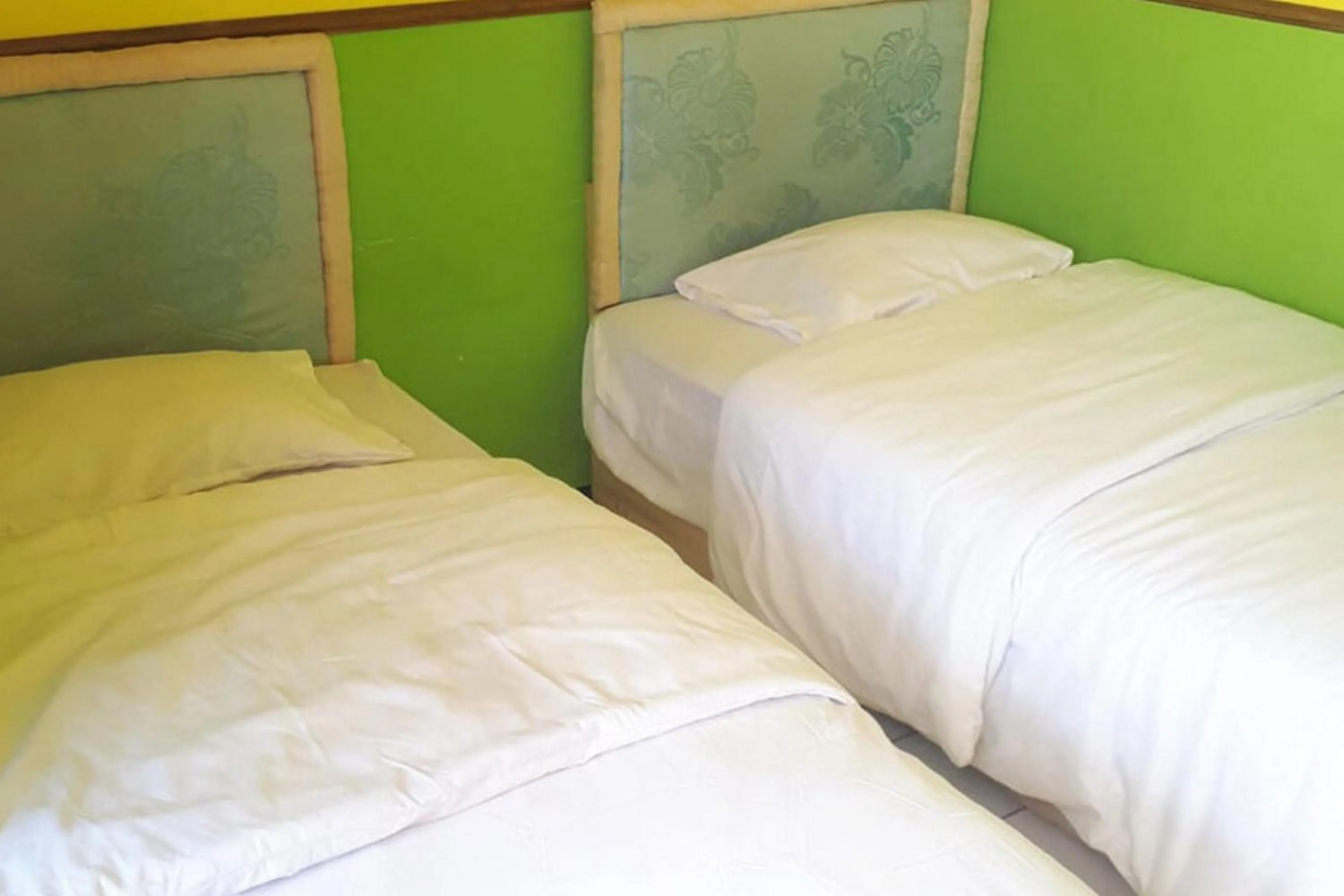 Bed in Ambar Tosari Homestay at Desa Wisata Bromo