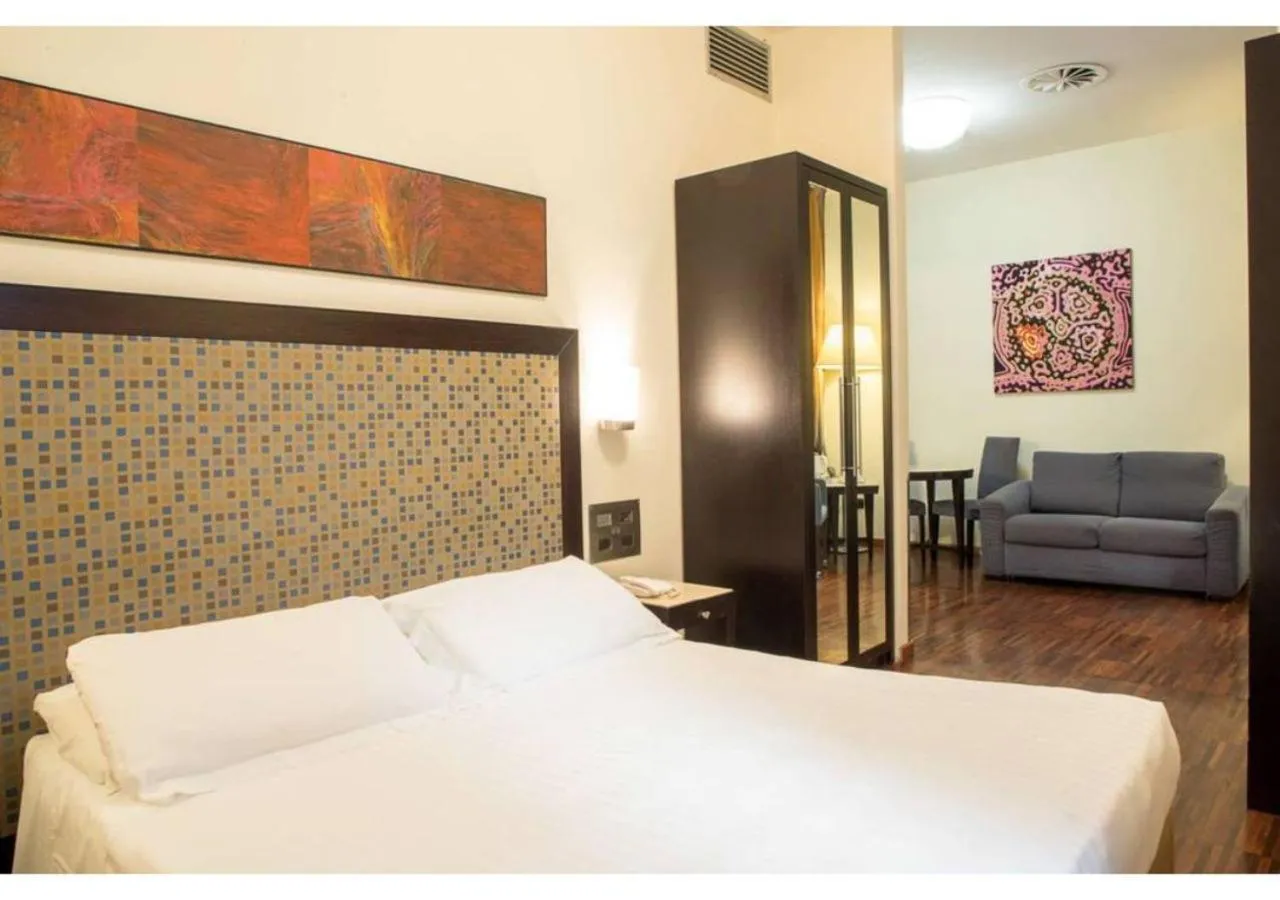 Photo of the whole room, Bed in Residenza Mecenate