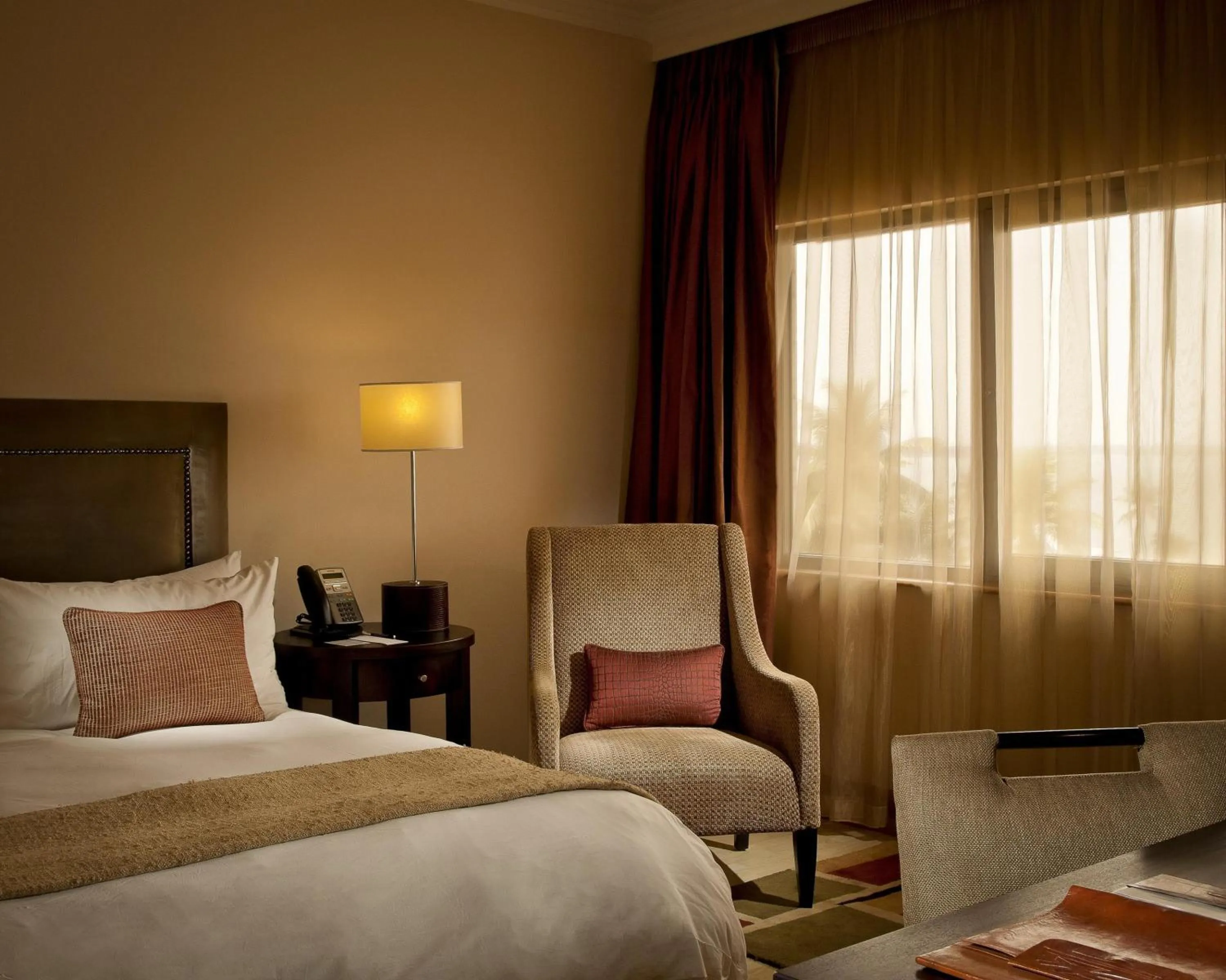 Bed in The Federal Palace Hotel and Casino