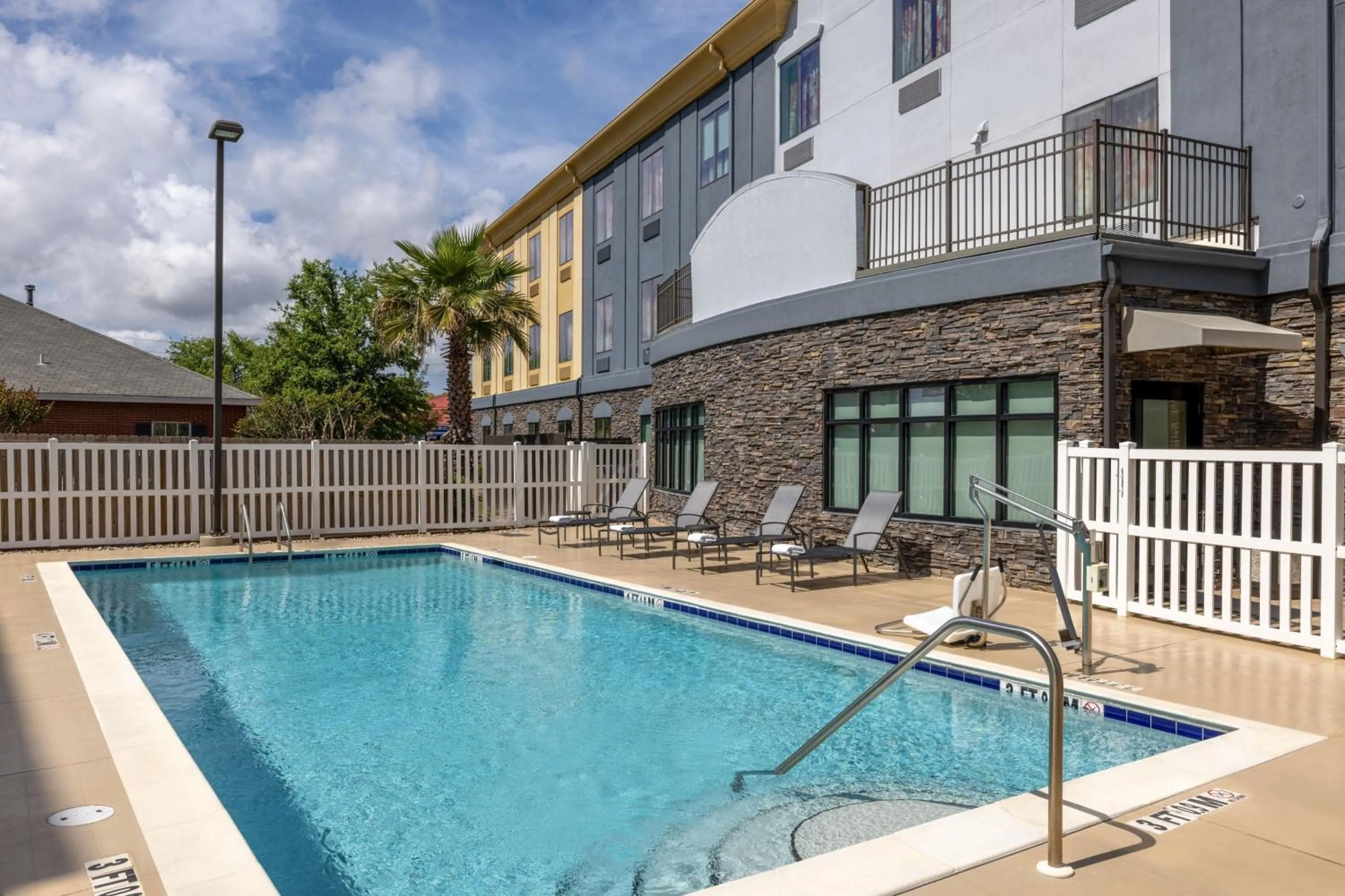 Swimming pool in Holiday Inn Express Hotel & Suites Fort Walton Beach Hurlburt Area, an IHG Hotel
