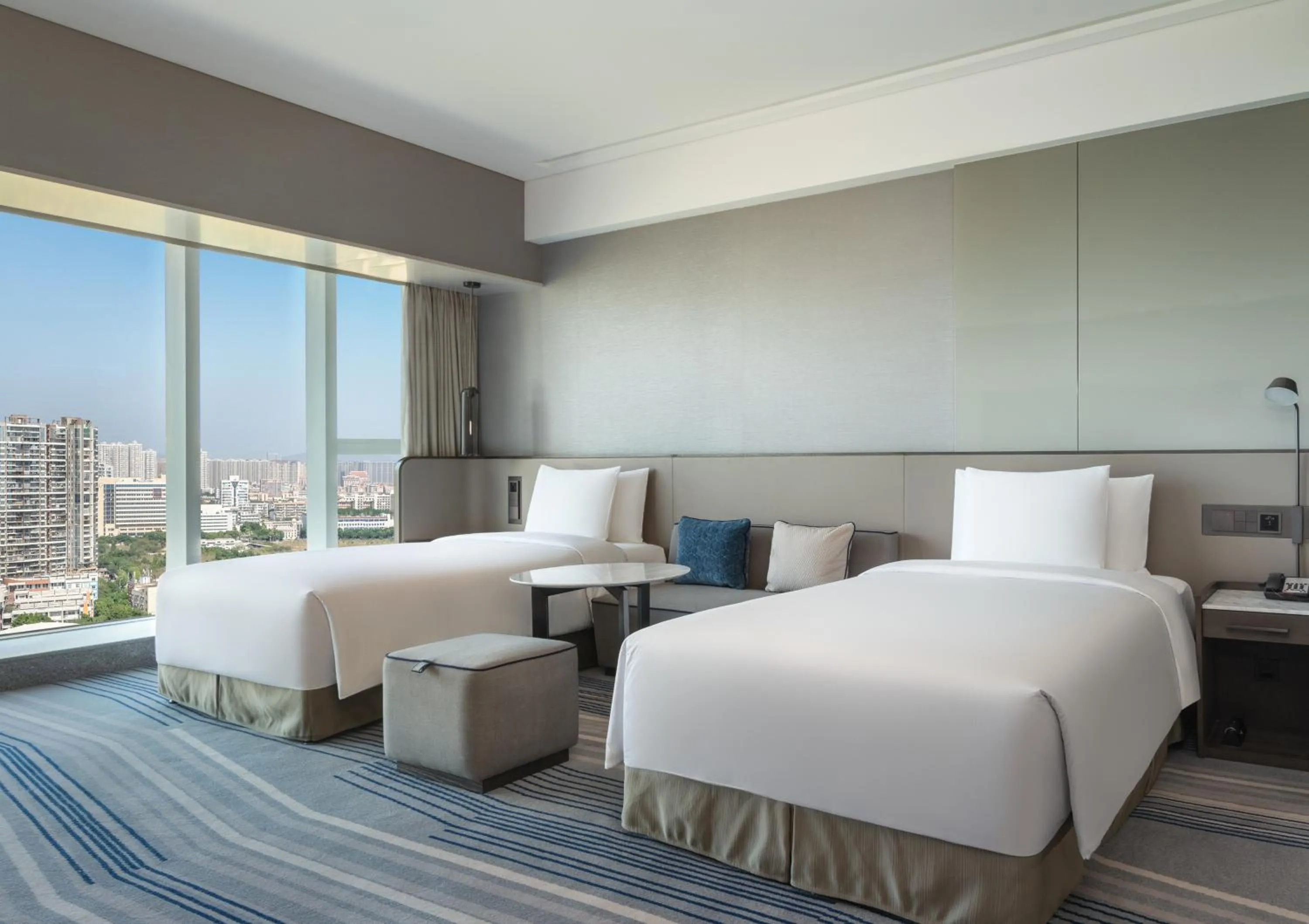 Photo of the whole room, Bed in Crowne Plaza Xiamen Jimei Seaview by IHG-Free Mini Bar