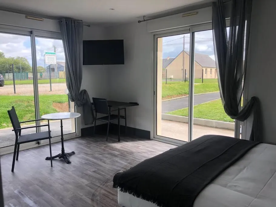 Bed in Le Rocher Appart Hôtel