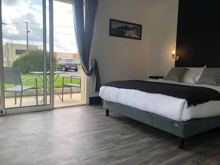 Bed in Le Rocher Appart Hôtel