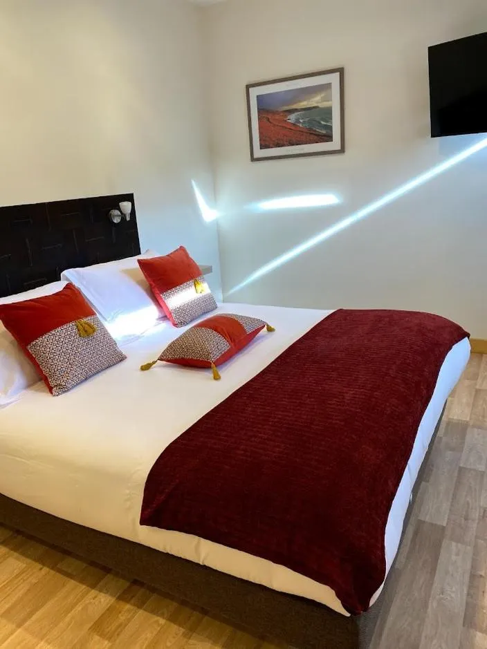 Bed in Le Rocher Appart Hôtel