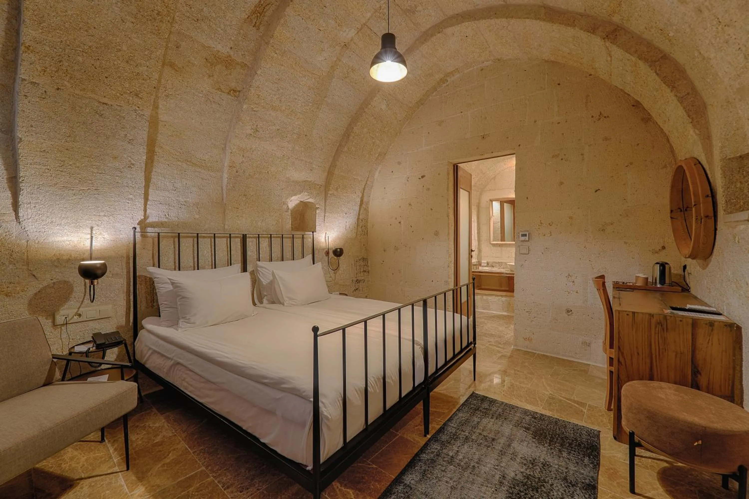 Bed in Solem Cave Suites