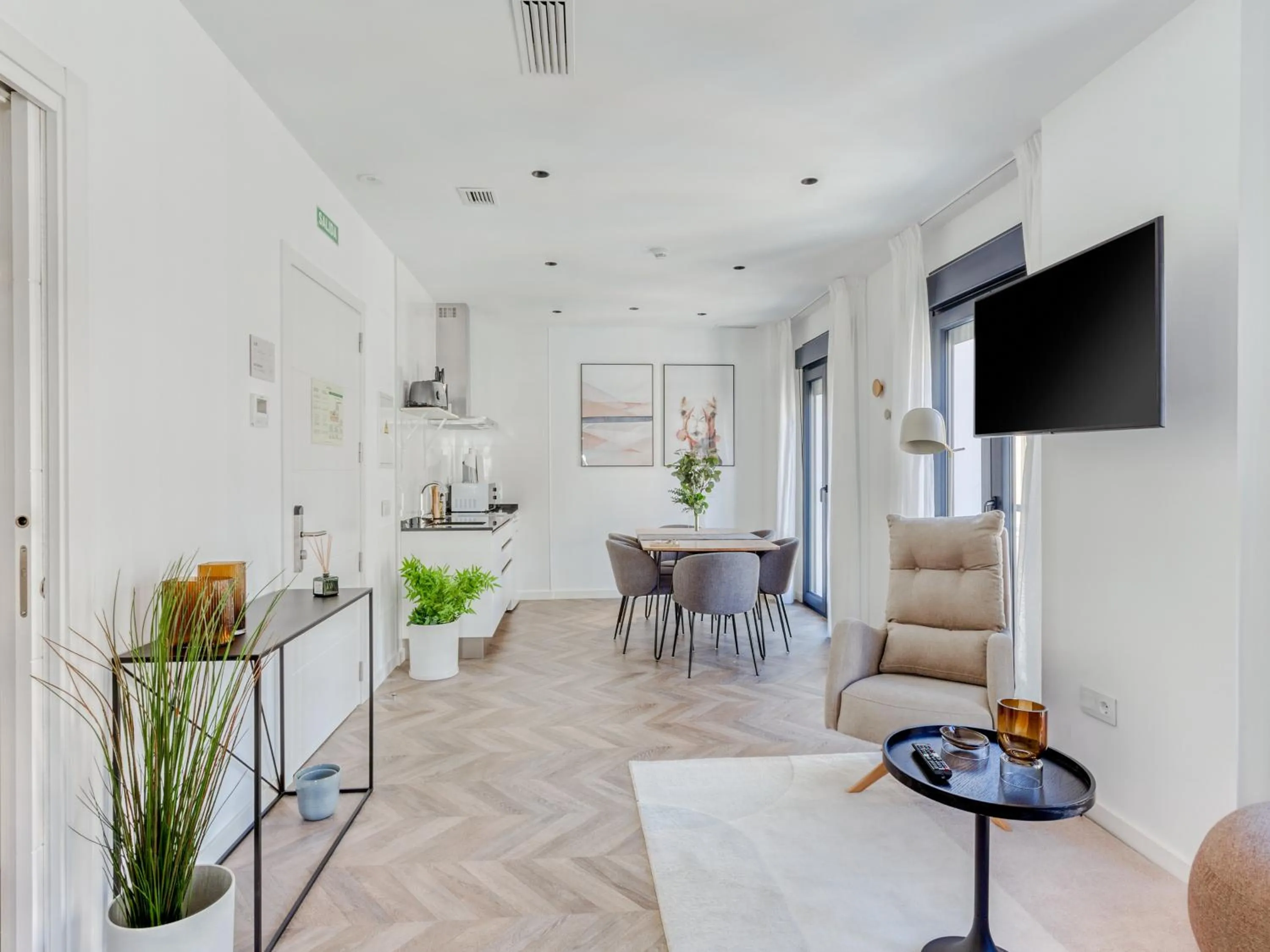 Seating area in Limehome Málaga Calle Ancha del Carmen - Digital Access