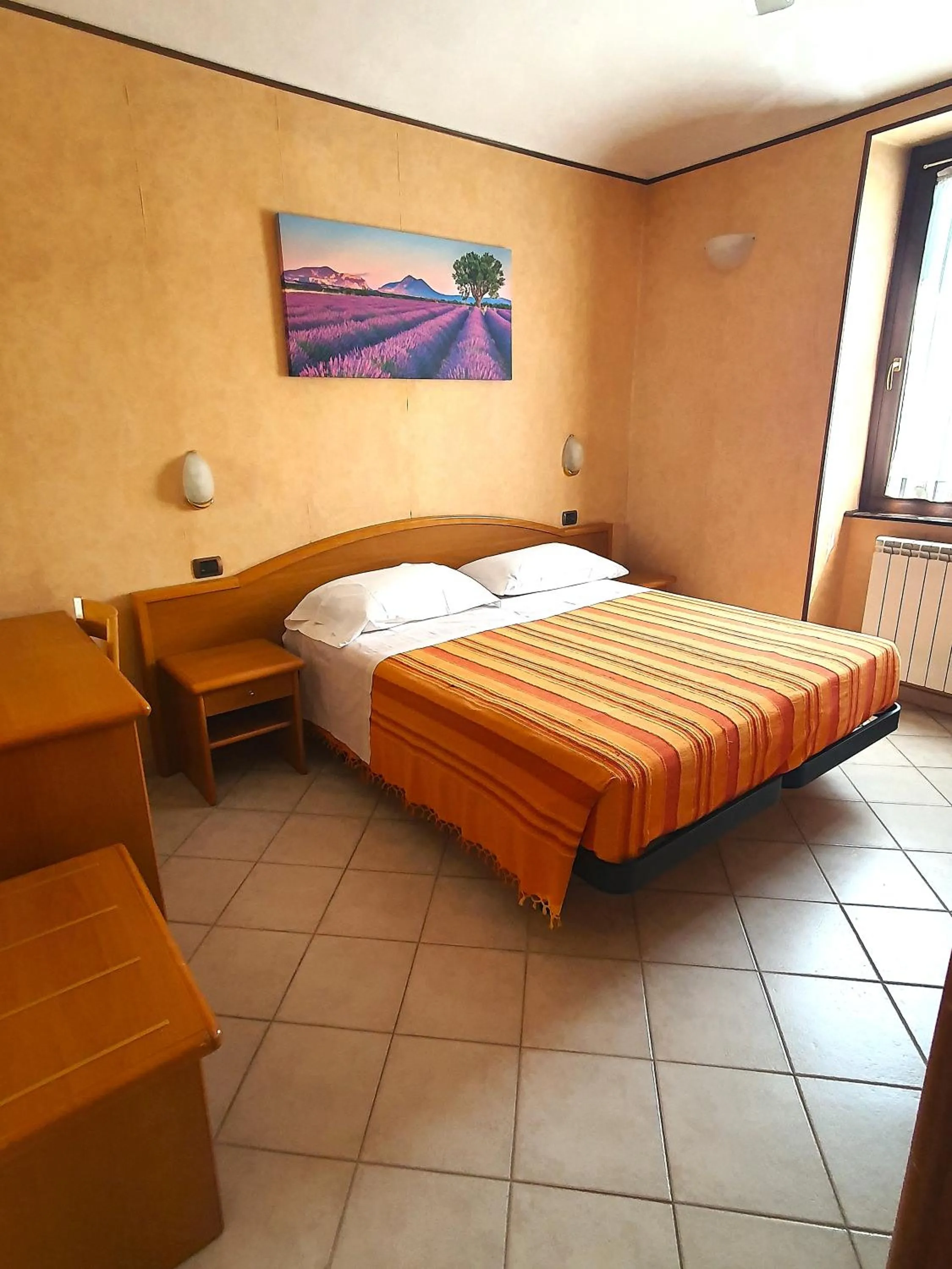 Bed in Hotel Isolabella