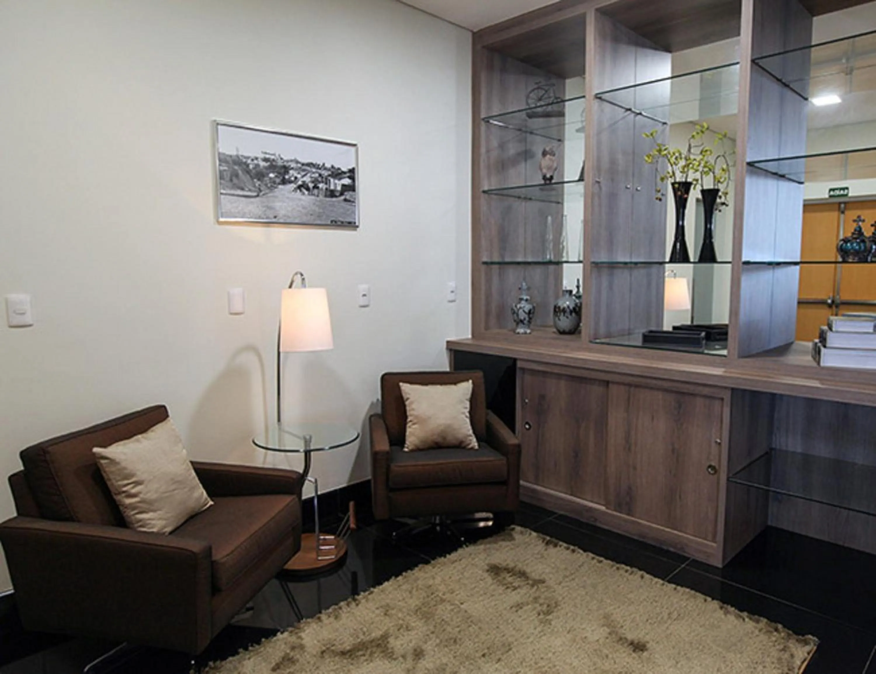 Communal lounge/ TV room in Porto Feliz Executive Hotel