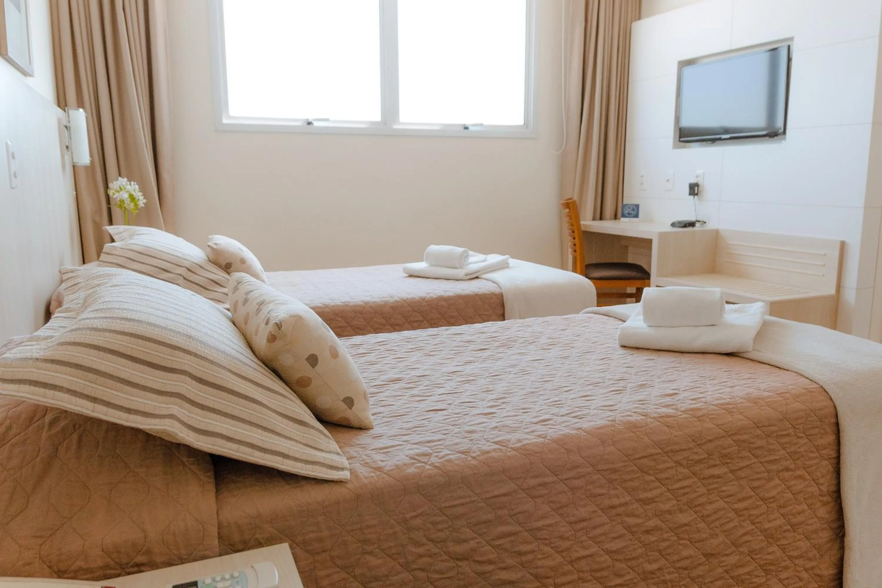 Bed in Porto Feliz Executive Hotel