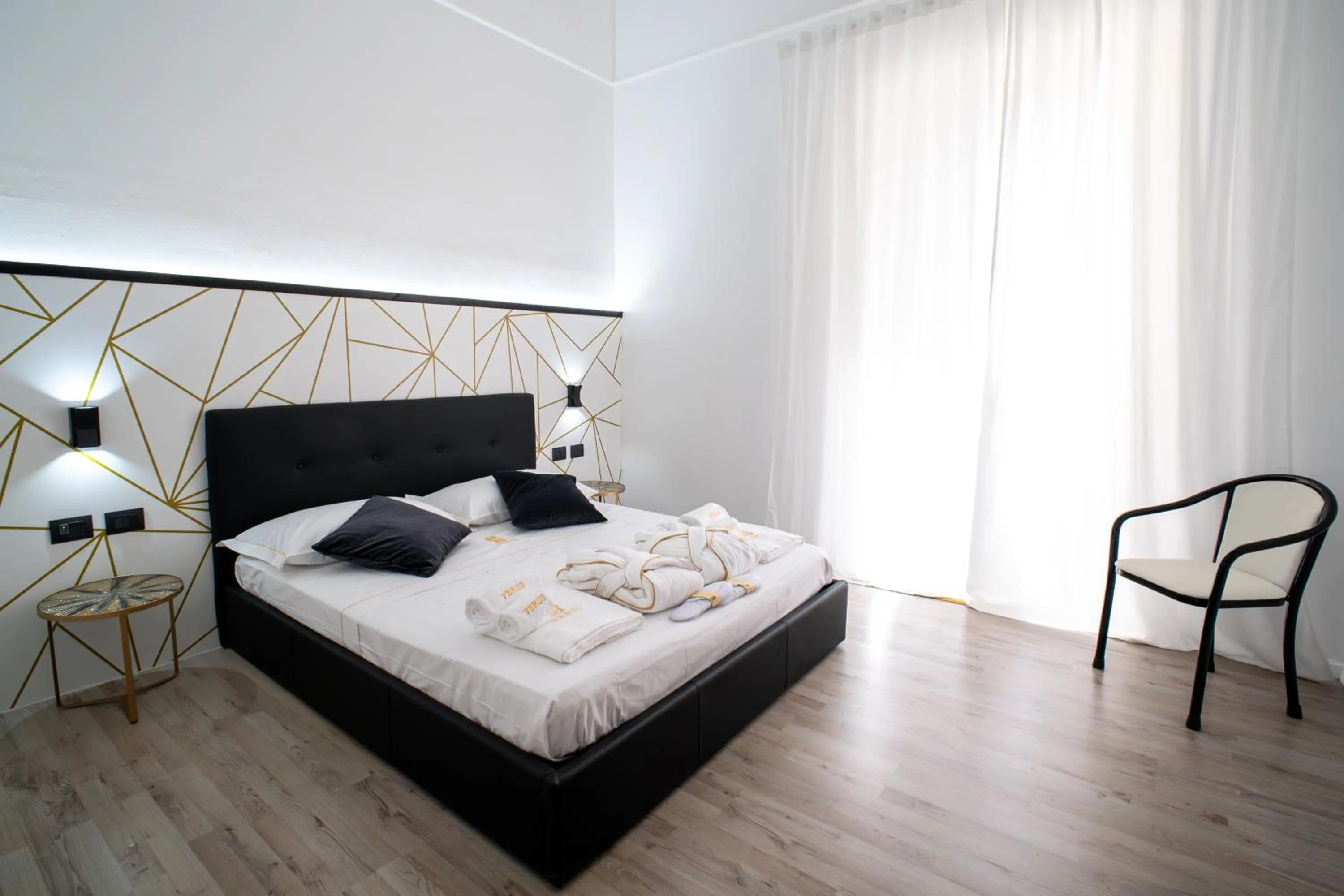 Photo of the whole room, Bed in Verus Room