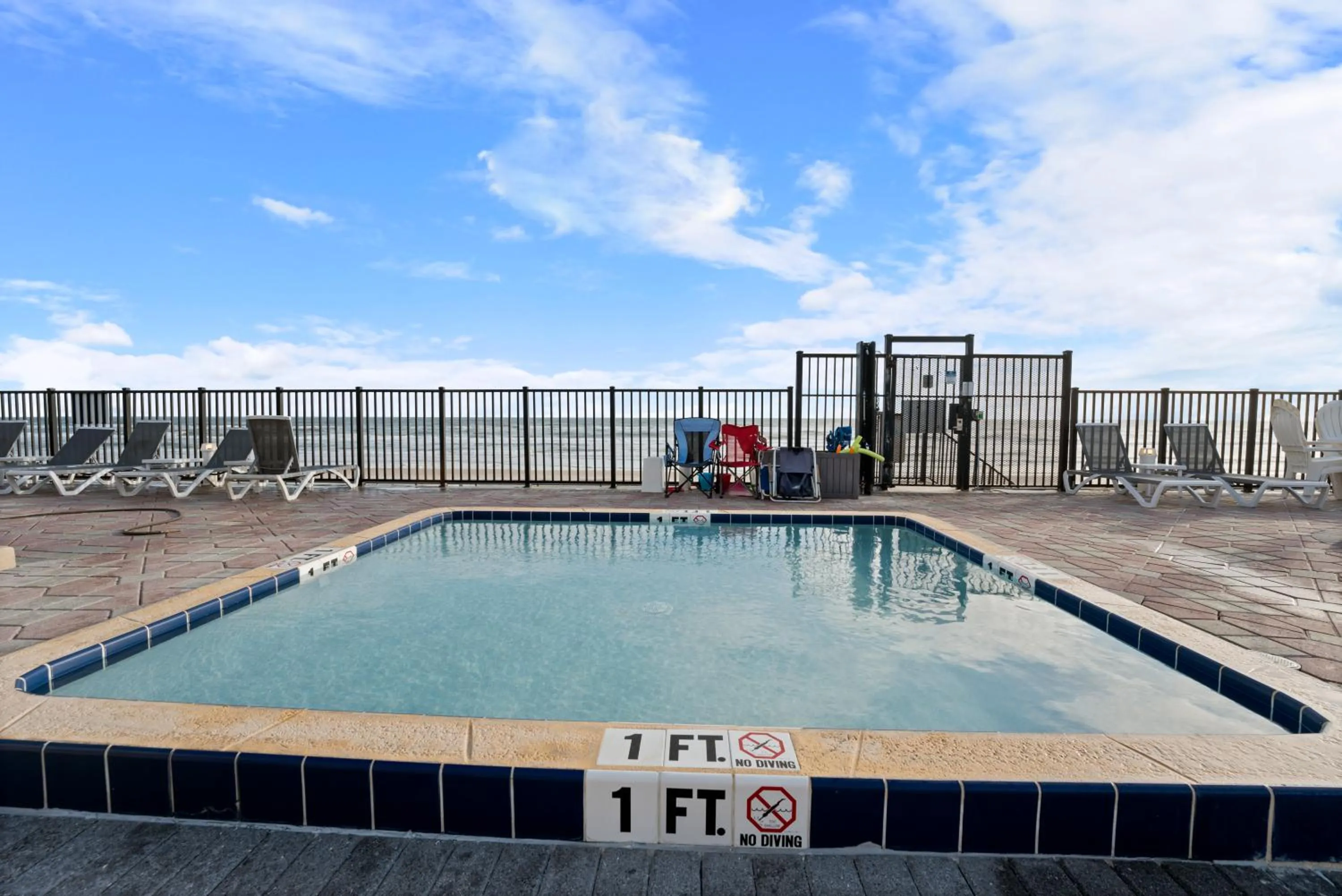Pool view in Outrigger Beach Club Resort