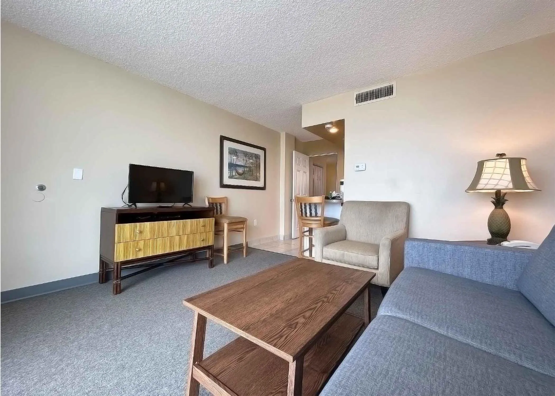 Communal lounge/ TV room in Outrigger Beach Club Resort