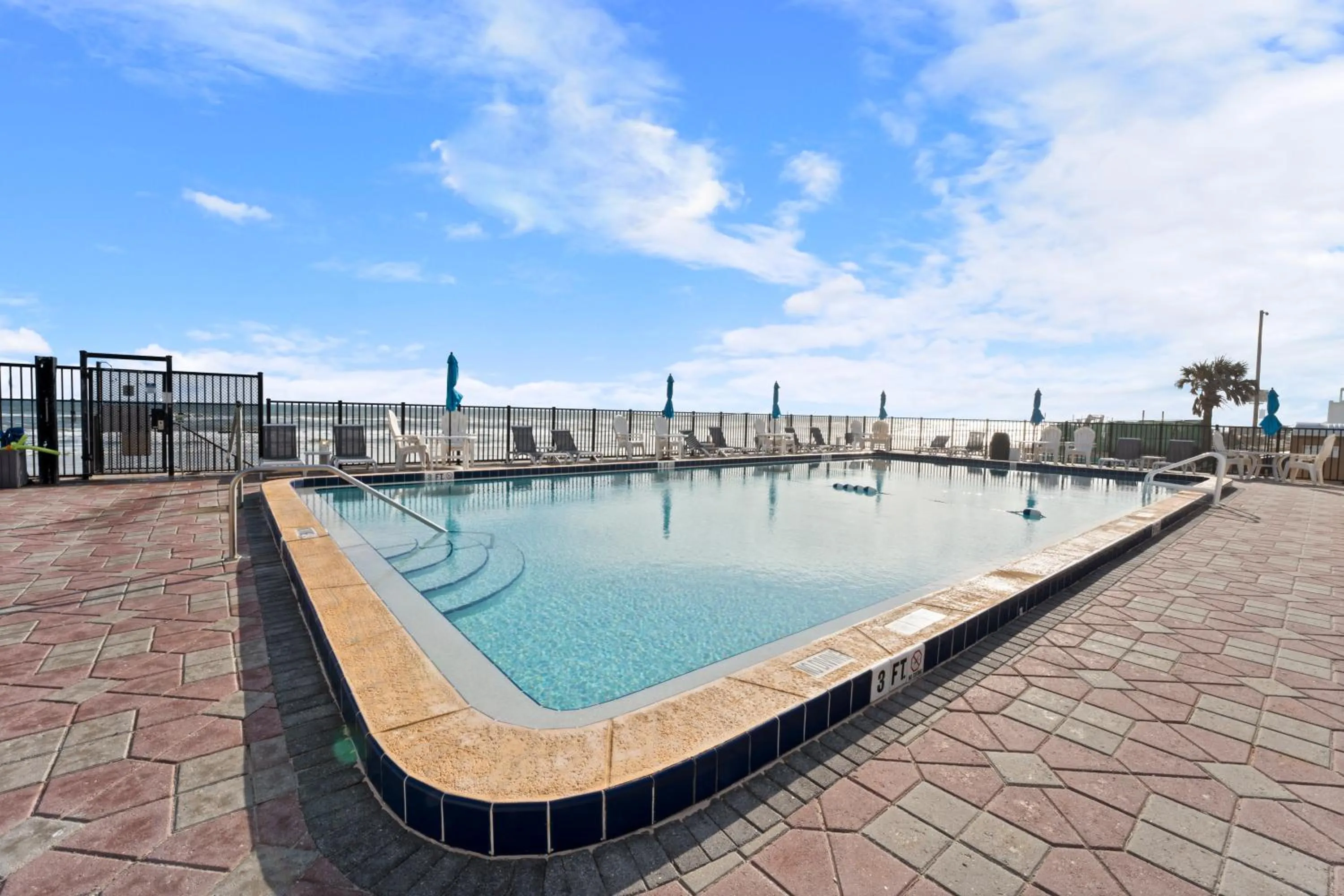 Pool view in Outrigger Beach Club Resort