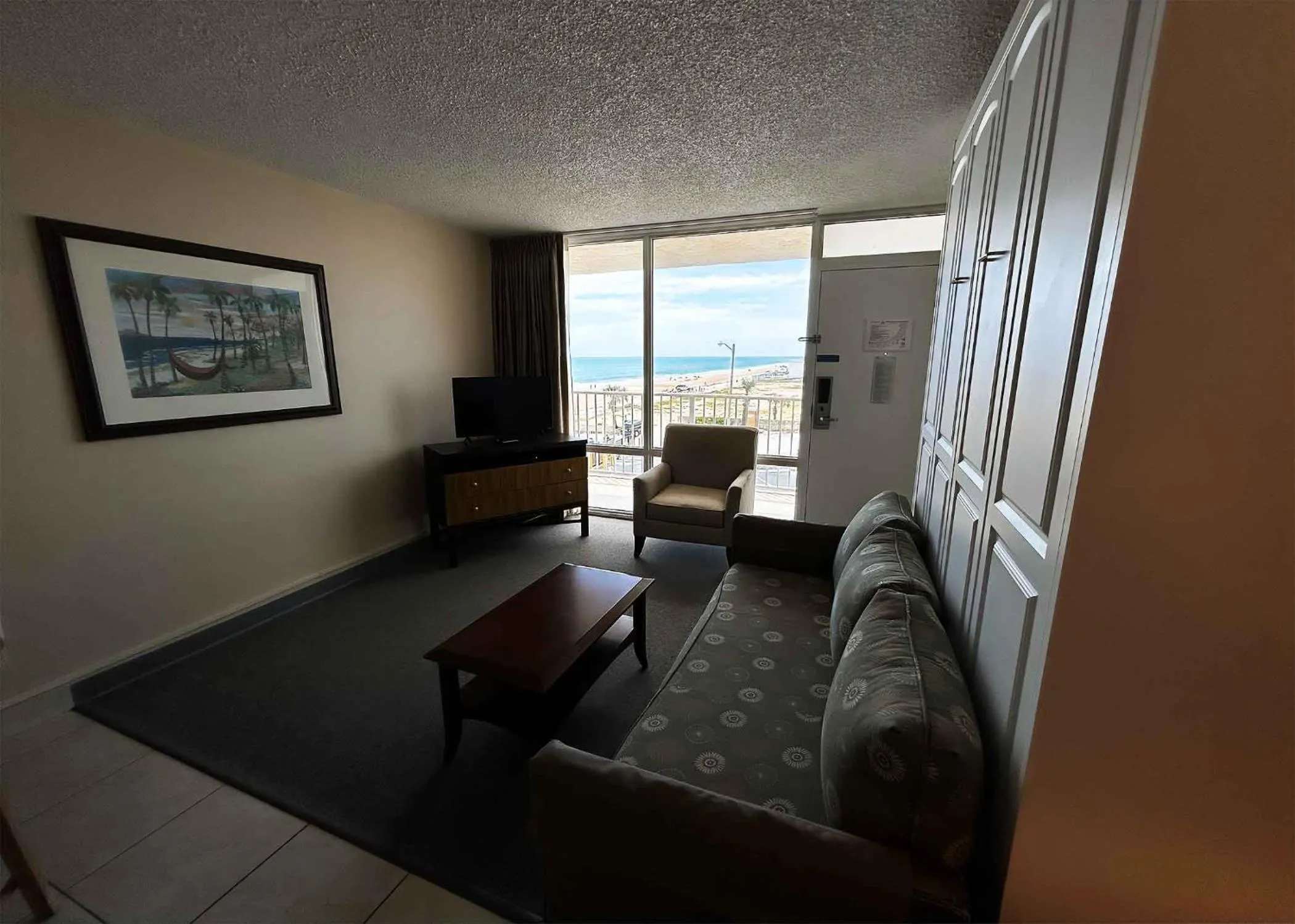 Communal lounge/ TV room in Outrigger Beach Club Resort