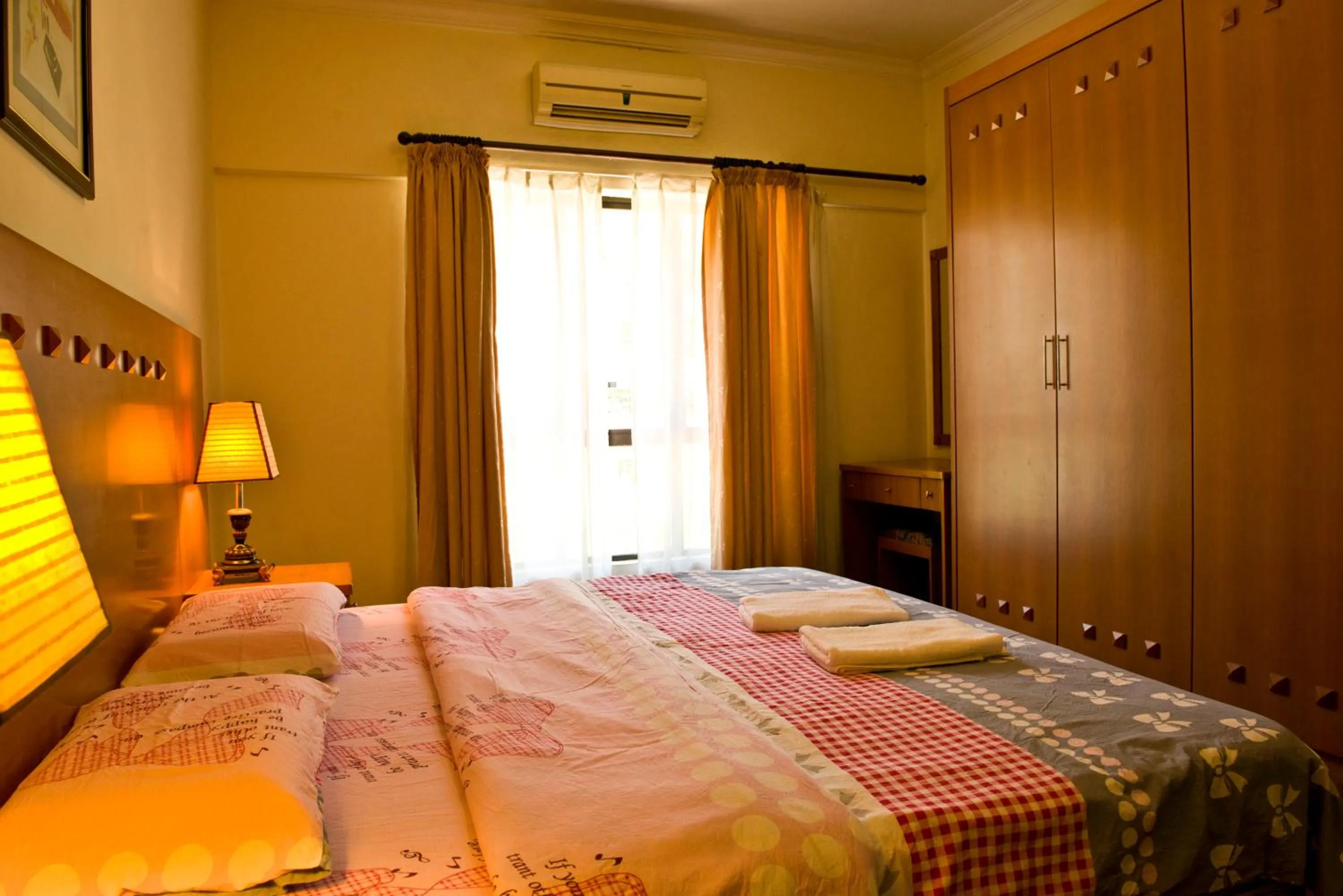 Photo of the whole room, Bed in Nana Marina Court
