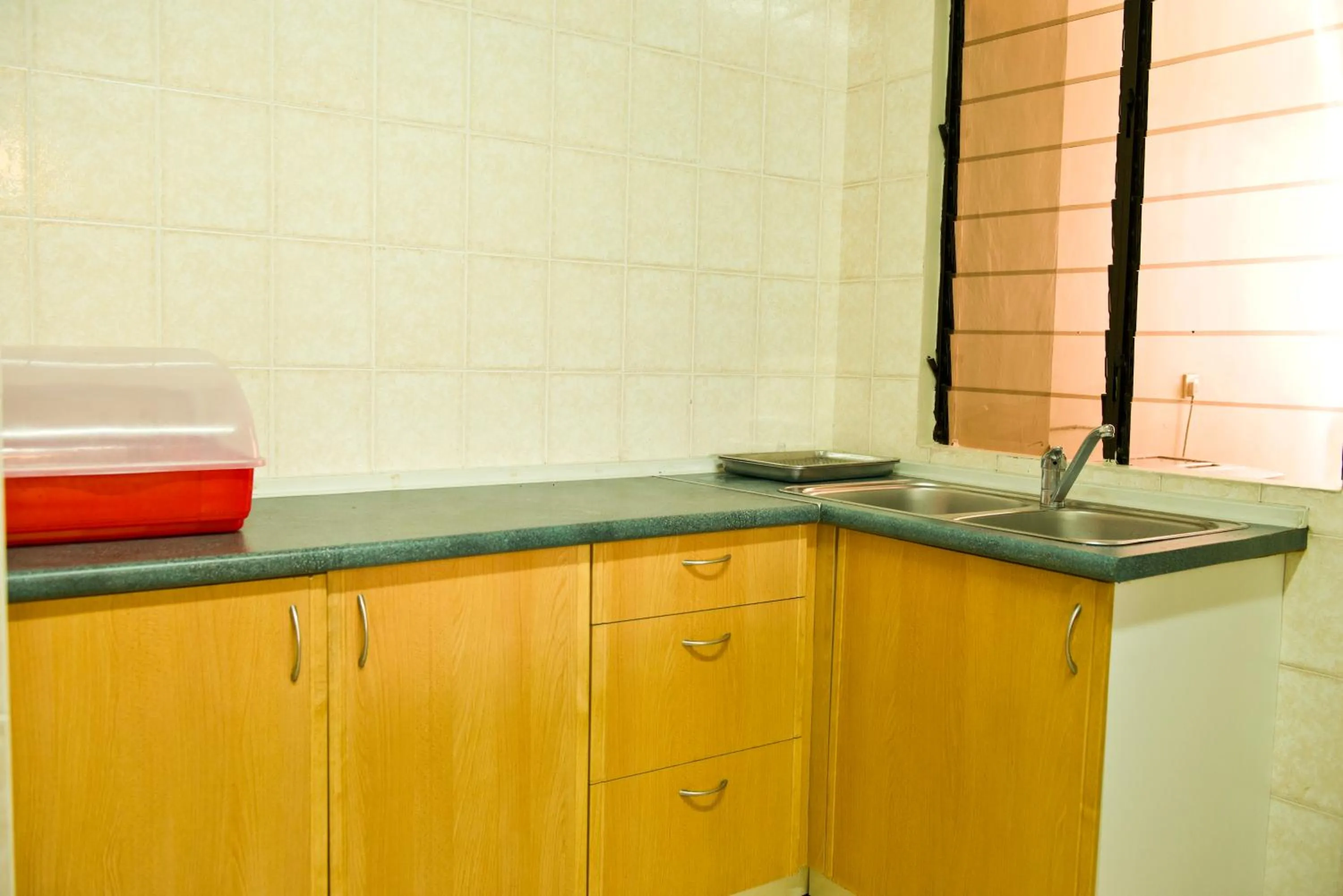 Kitchen or kitchenette in Nana Marina Court