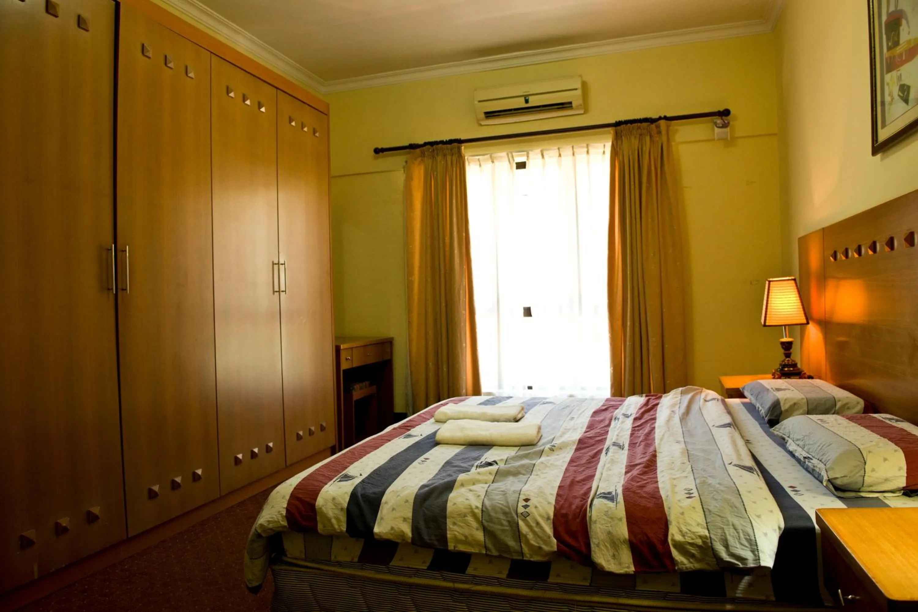 Bed in Nana Marina Court