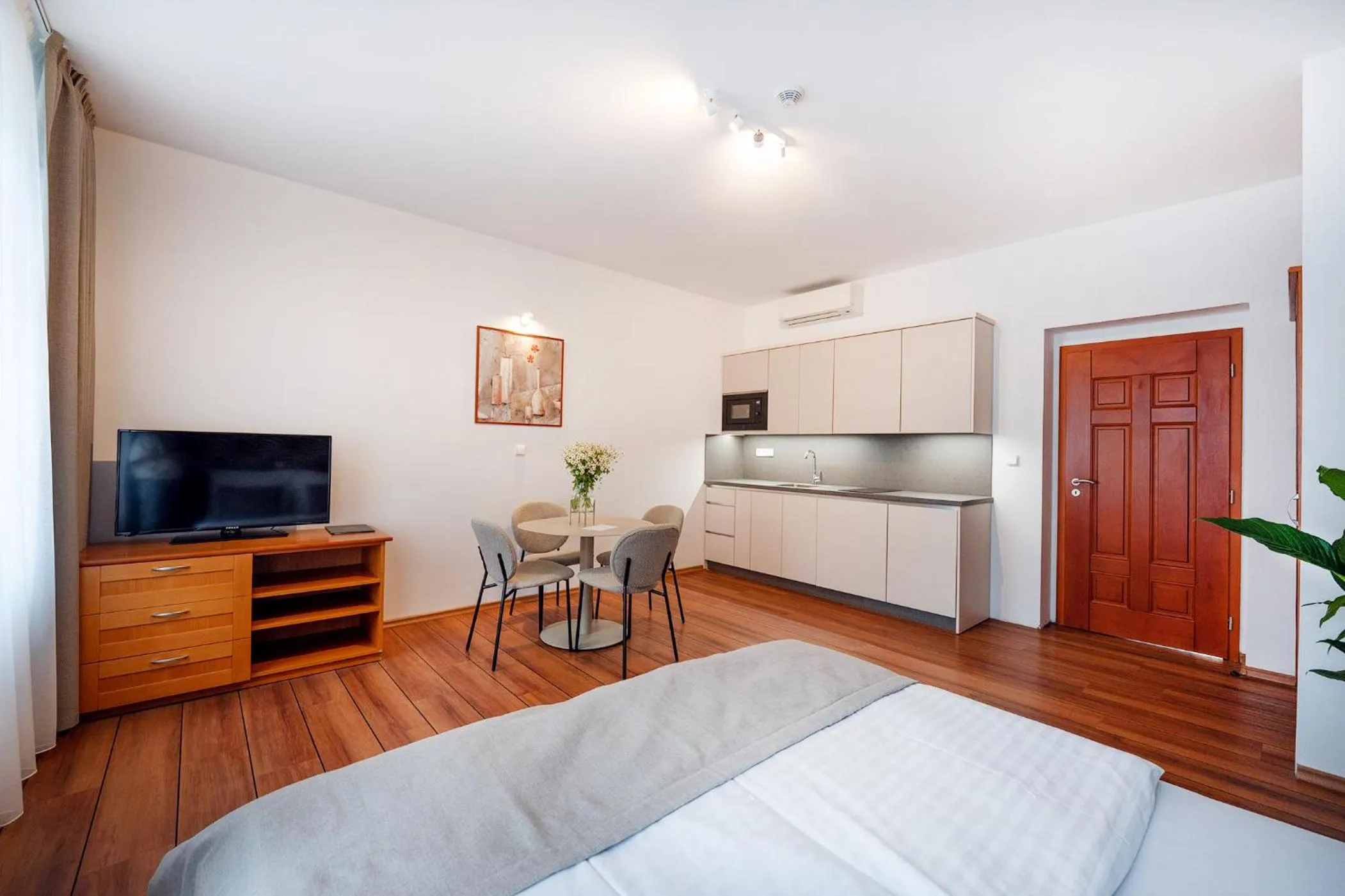 Kitchen or kitchenette, Bed in Anděl Apartments Praha