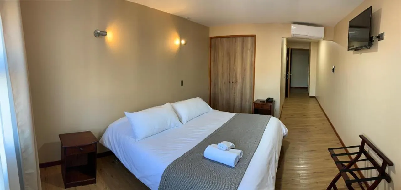 Bed in Gran Hotel Aysen