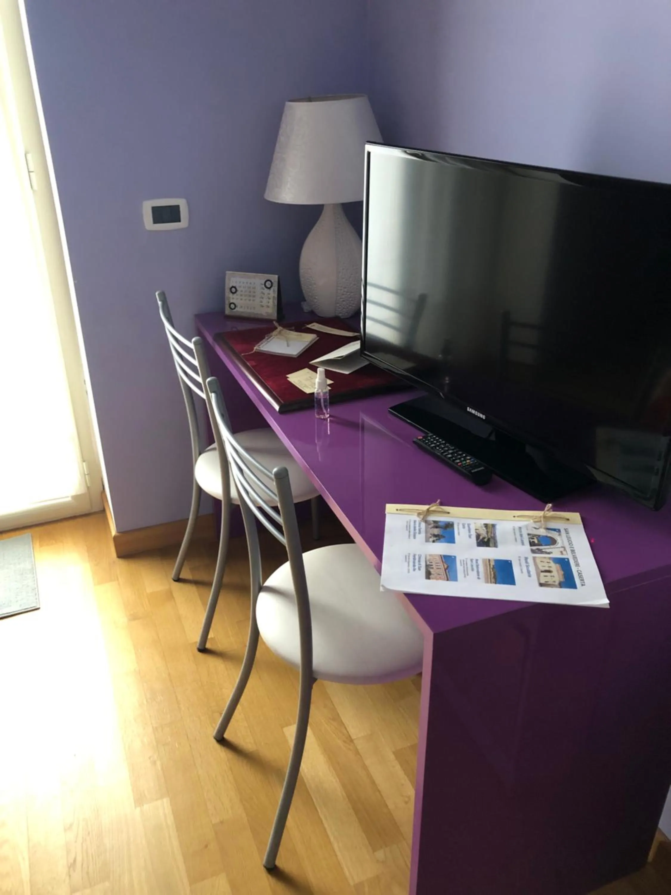 Communal lounge/ TV room in Il Giardino della Reggia