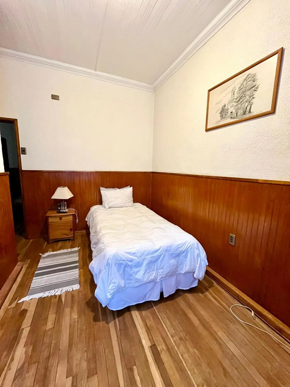 Bed in CHALET CHAPITAL Punta Arenas