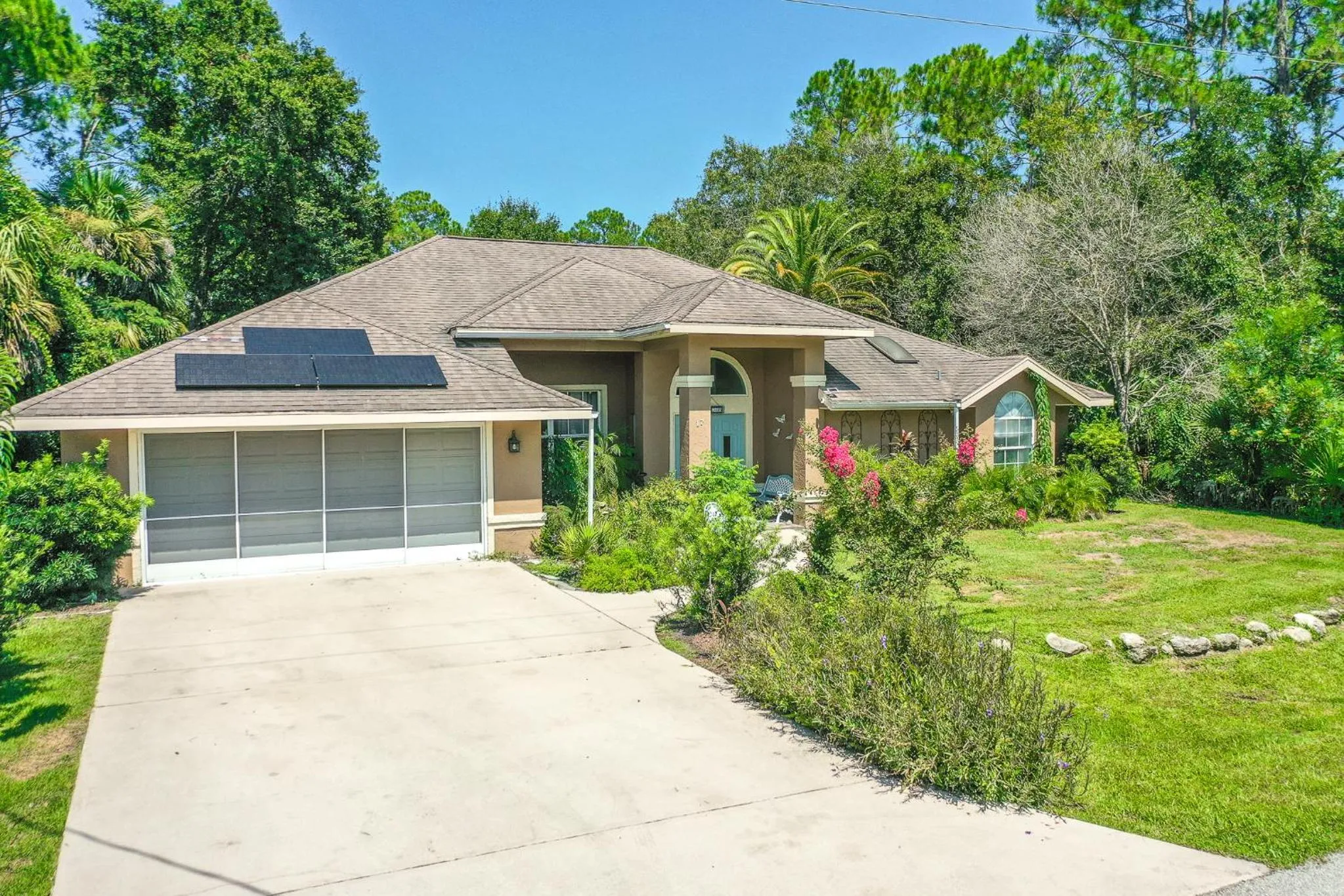 Property building in Tropical Escape with Relaxing Heated Pool & Palm Breezes