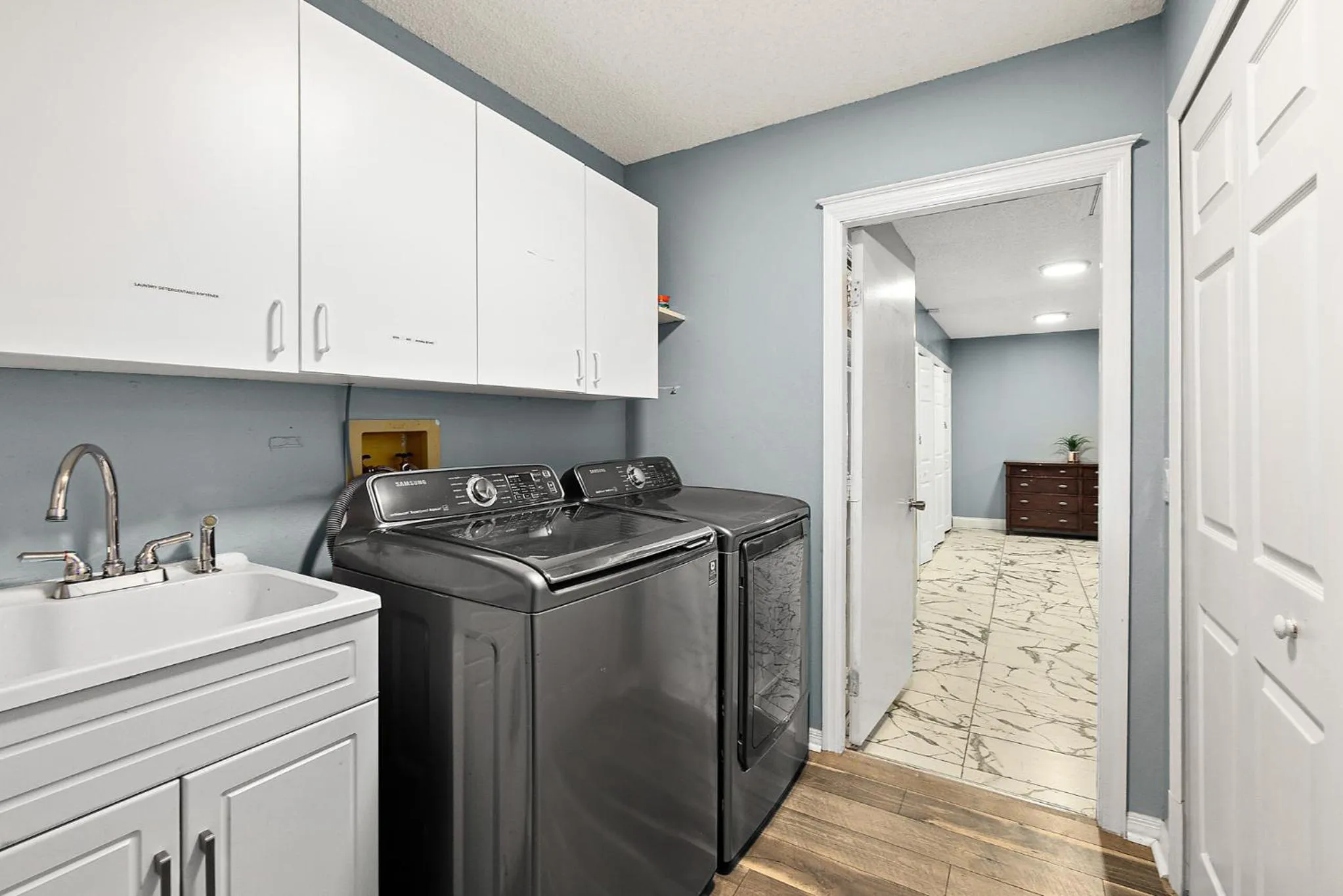 washing machine in Tropical Escape with Relaxing Heated Pool & Palm Breezes