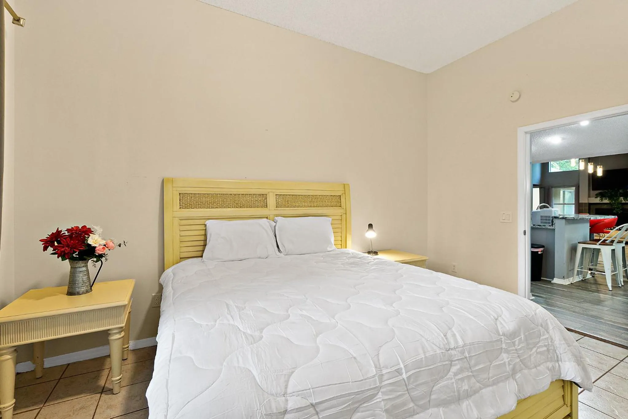 Bed in Tropical Escape with Relaxing Heated Pool & Palm Breezes