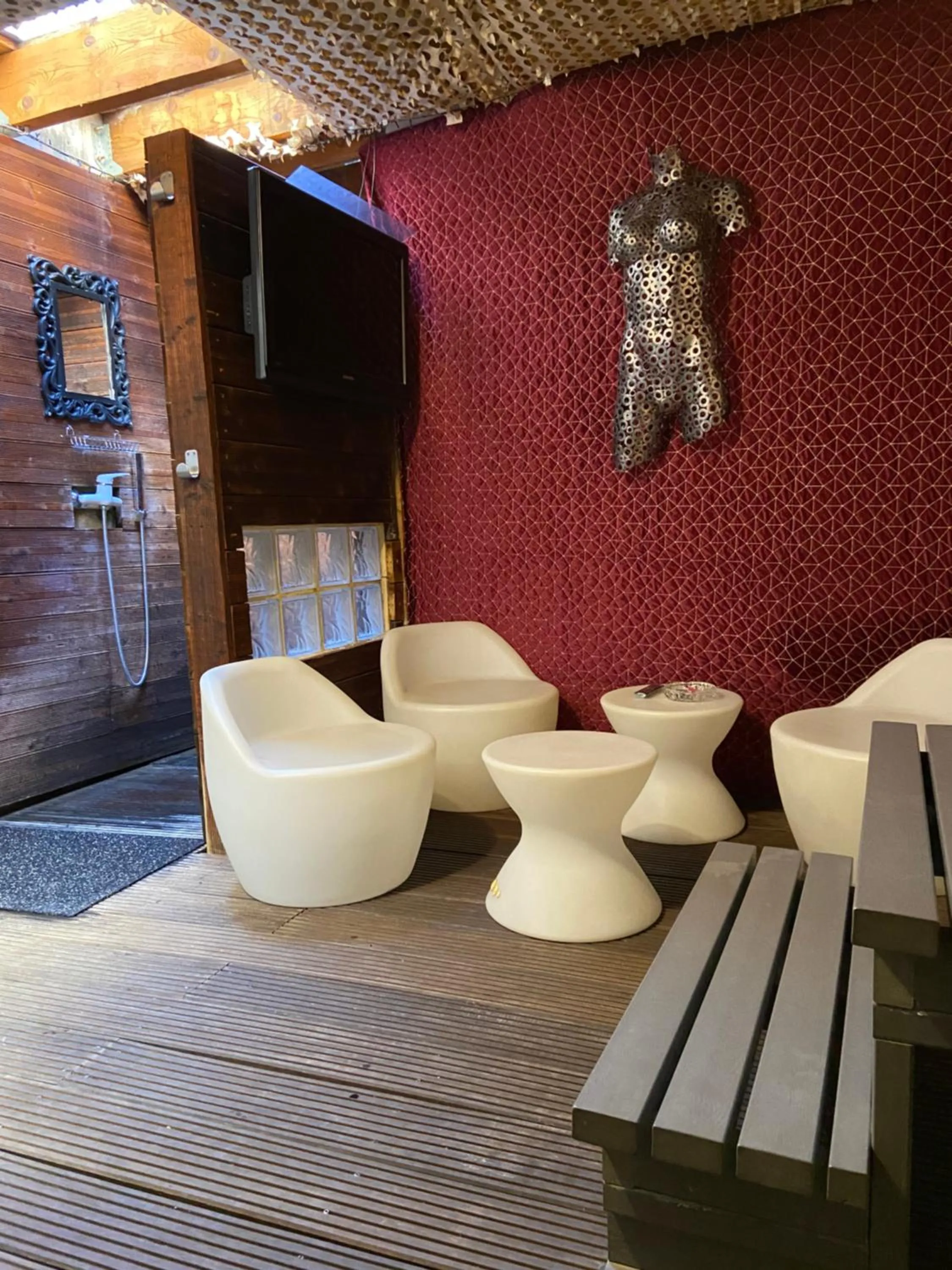 Lounge or bar in Dépendance cosy climatisée jacuzzi diner aux chandelles