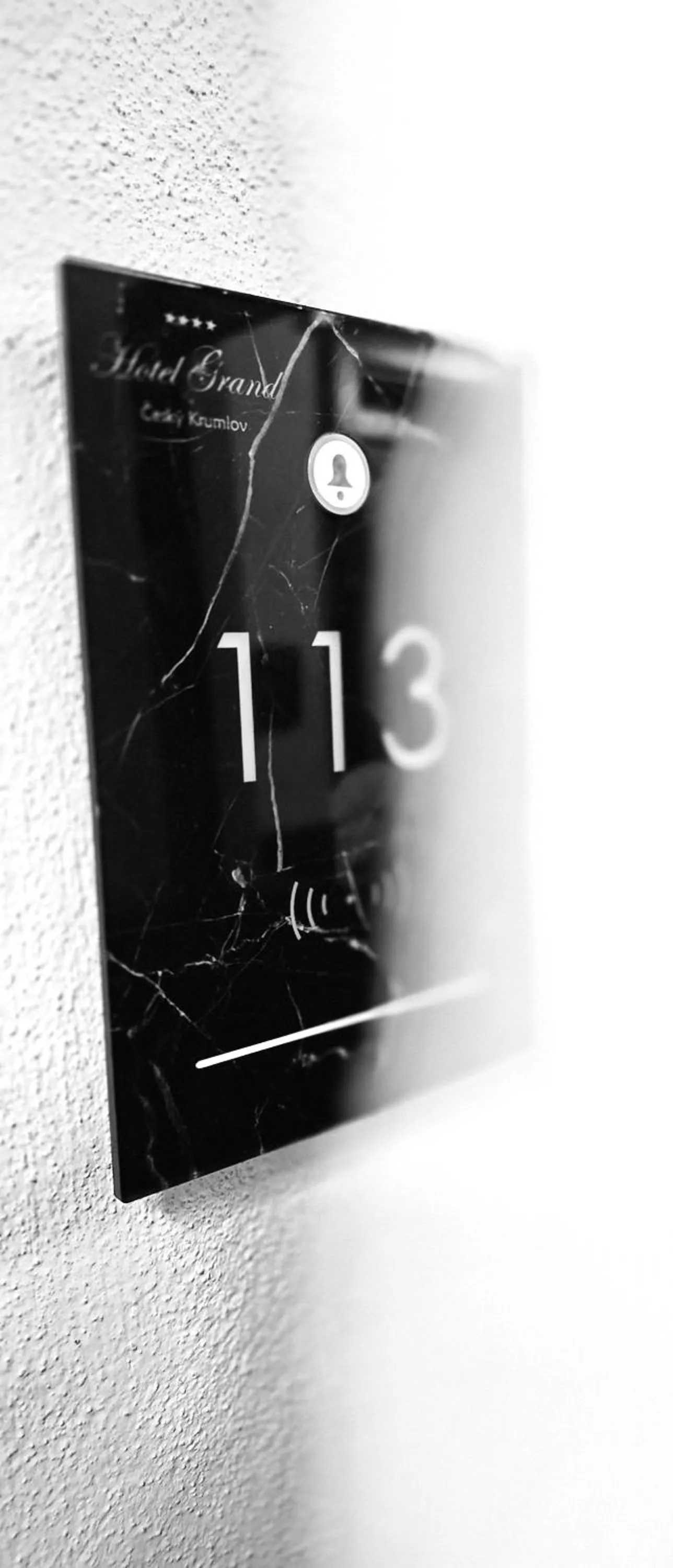 Property logo or sign in Hotel Grand