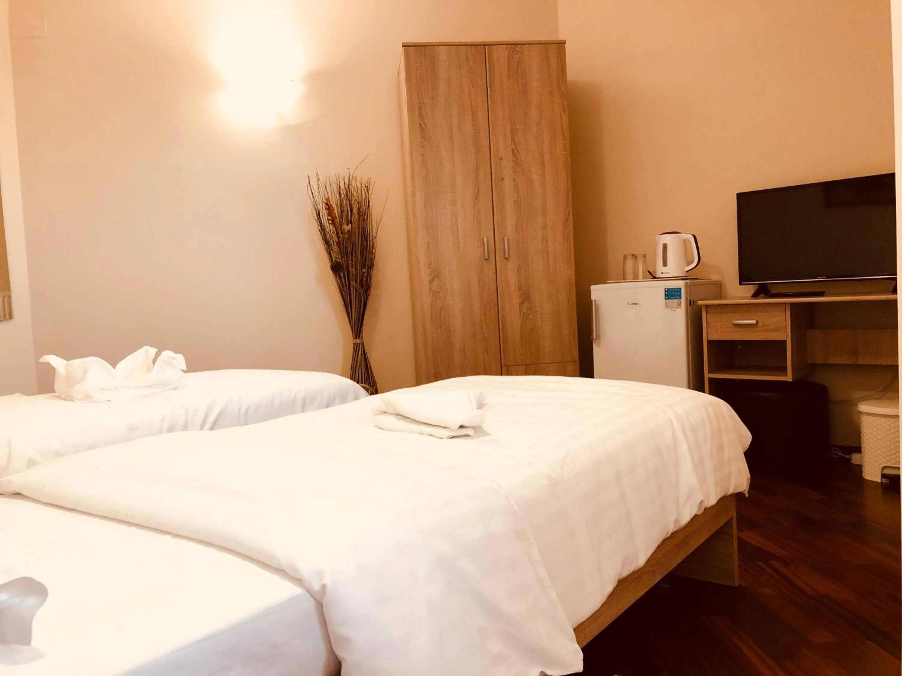 Bed in Monte Carlo Palace Rooms