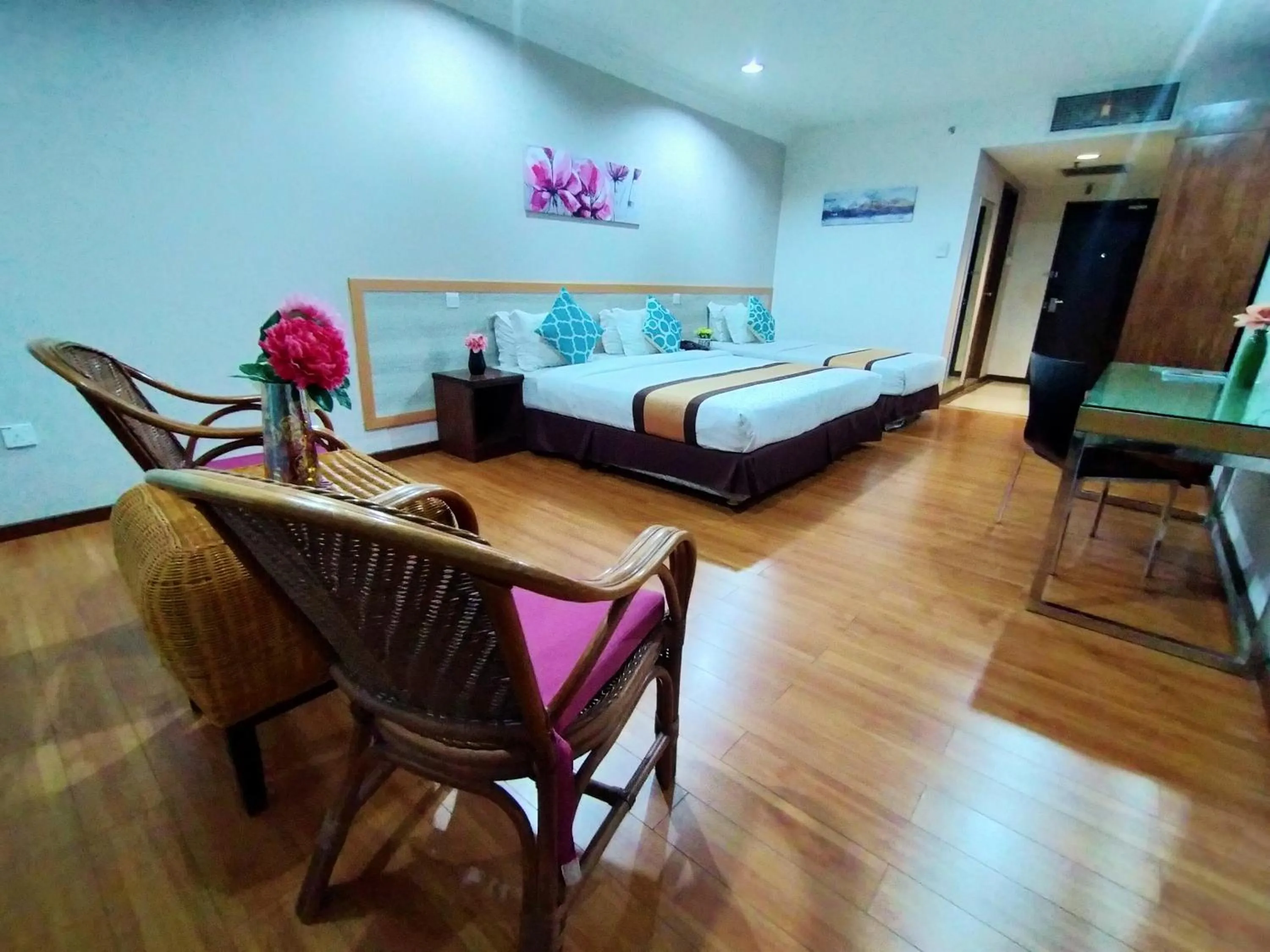 Bed in TD Plaza Hotel