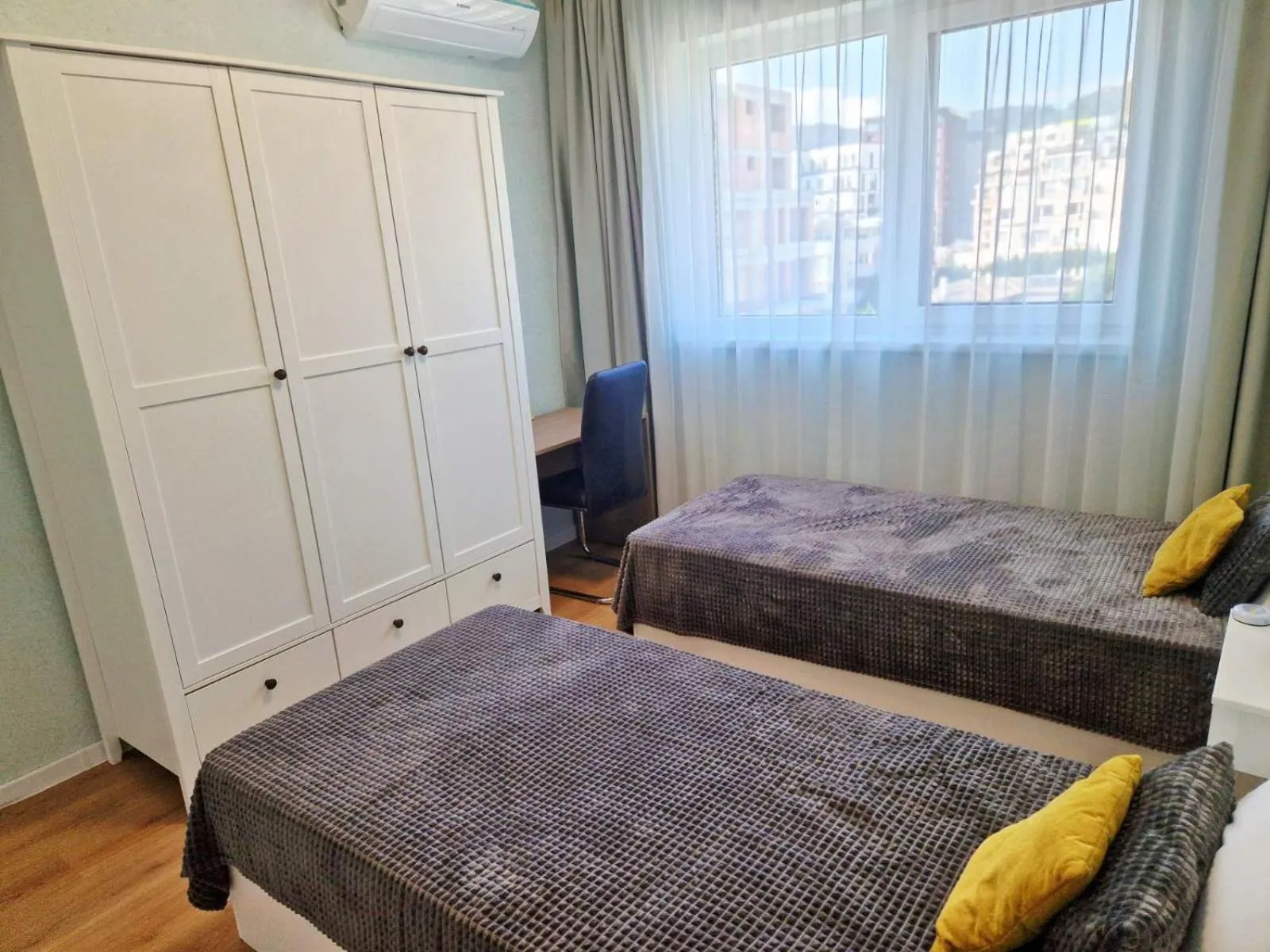 Bed in PAPAYA APARTMENTS