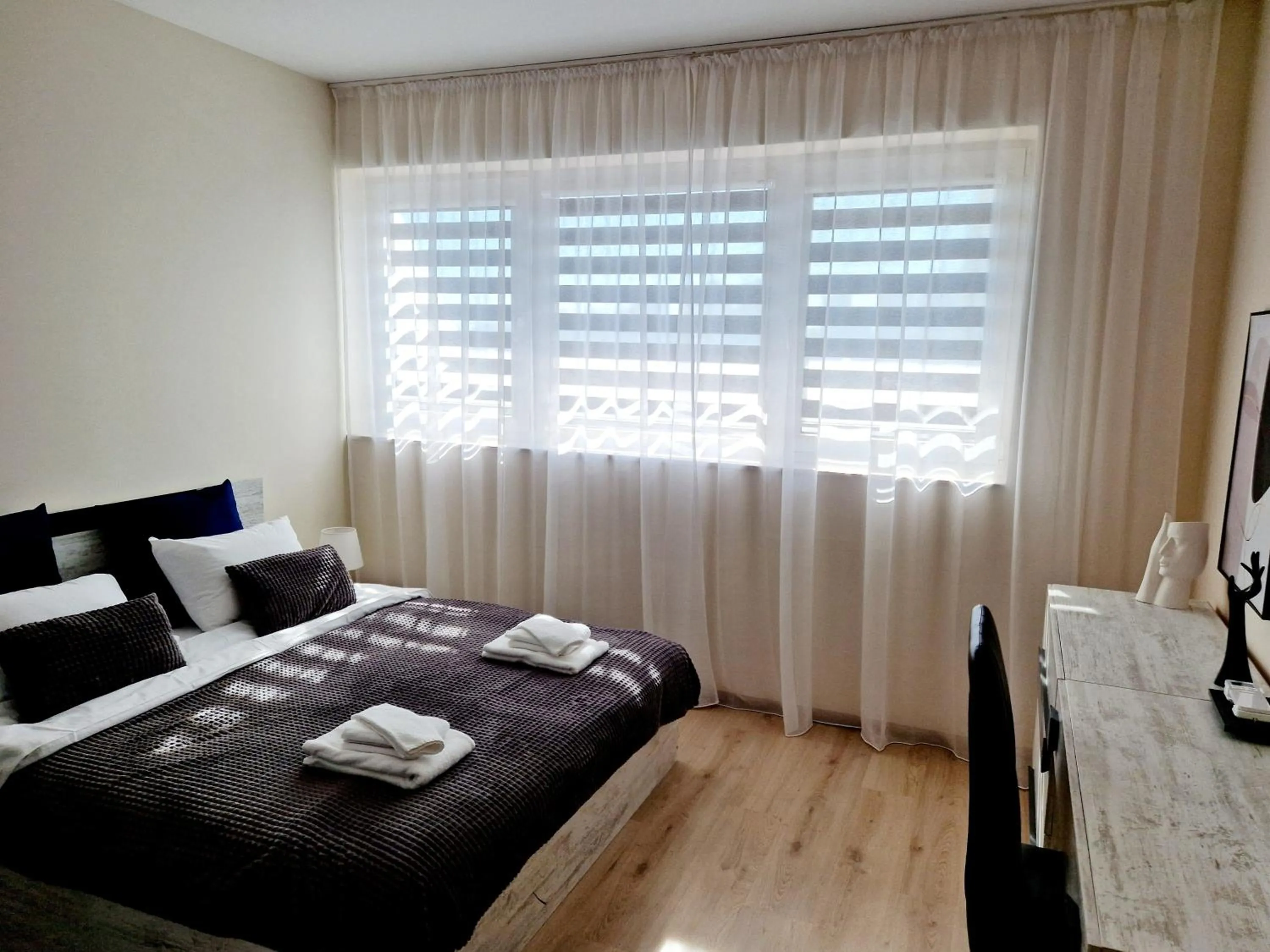 Bed in PAPAYA APARTMENTS