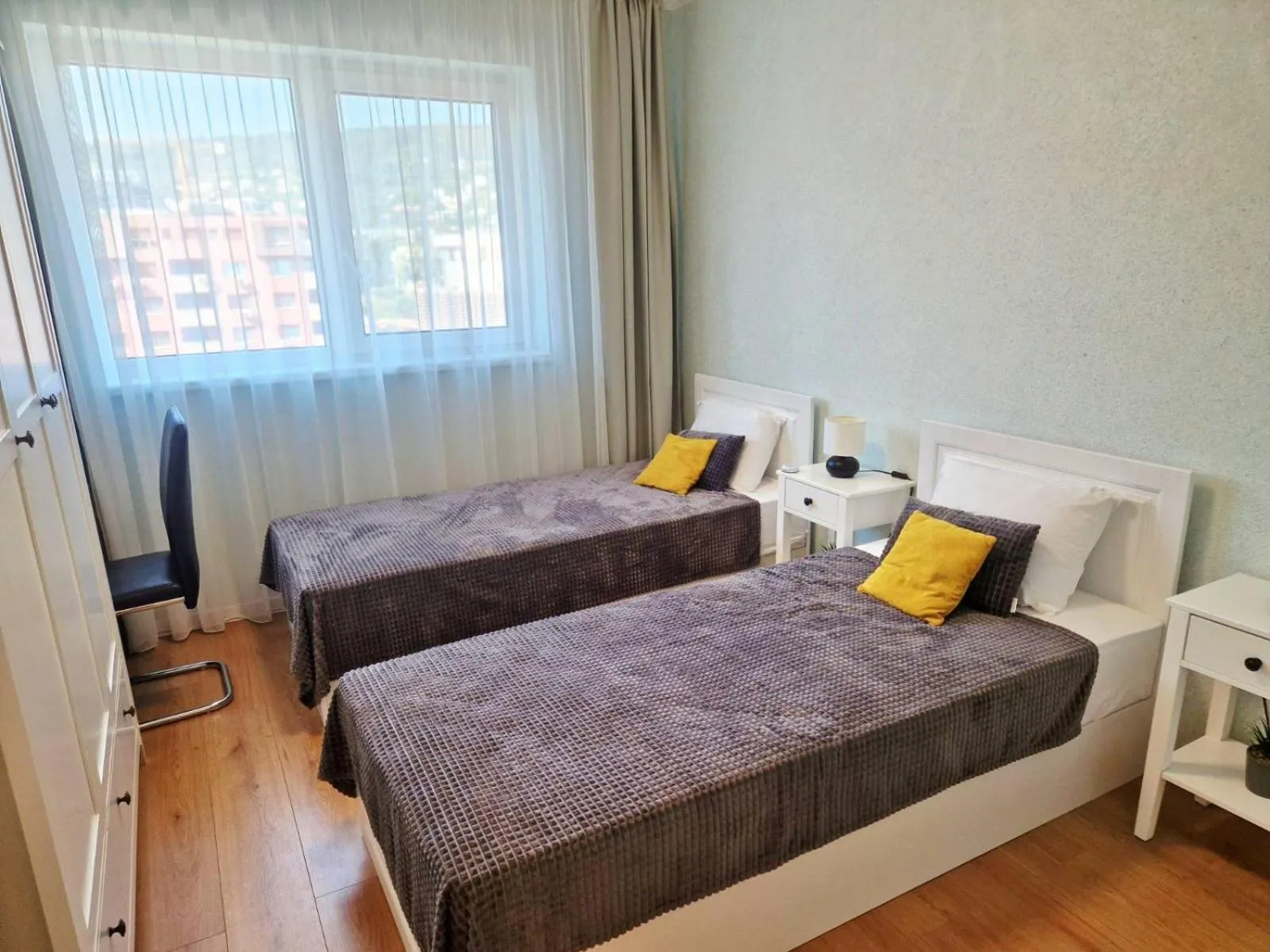 Bed in PAPAYA APARTMENTS